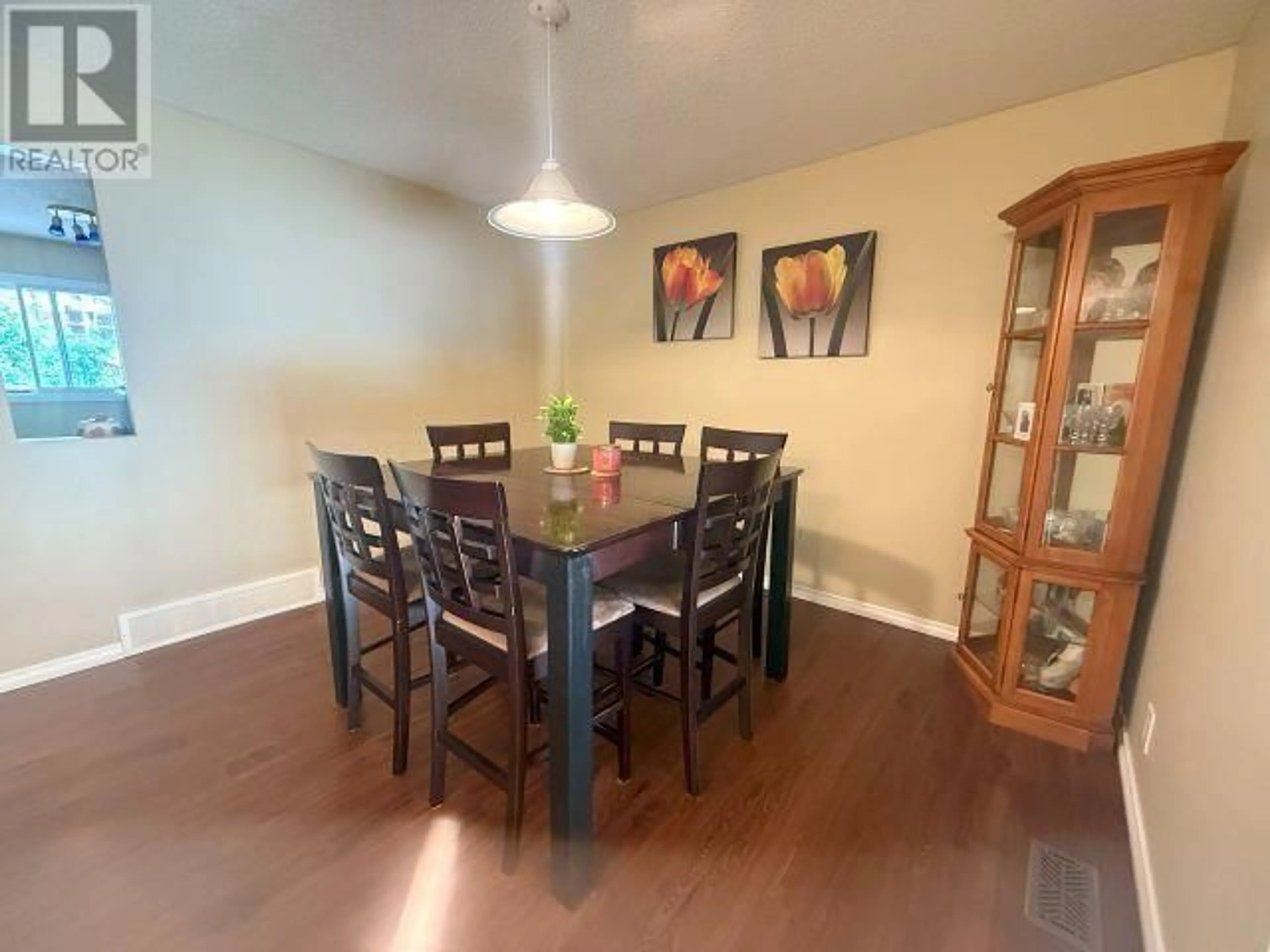 Dining room, wood/laminate floor for 8248 ST LAWRENCE AVENUE, Prince George British Columbia V2N4K8