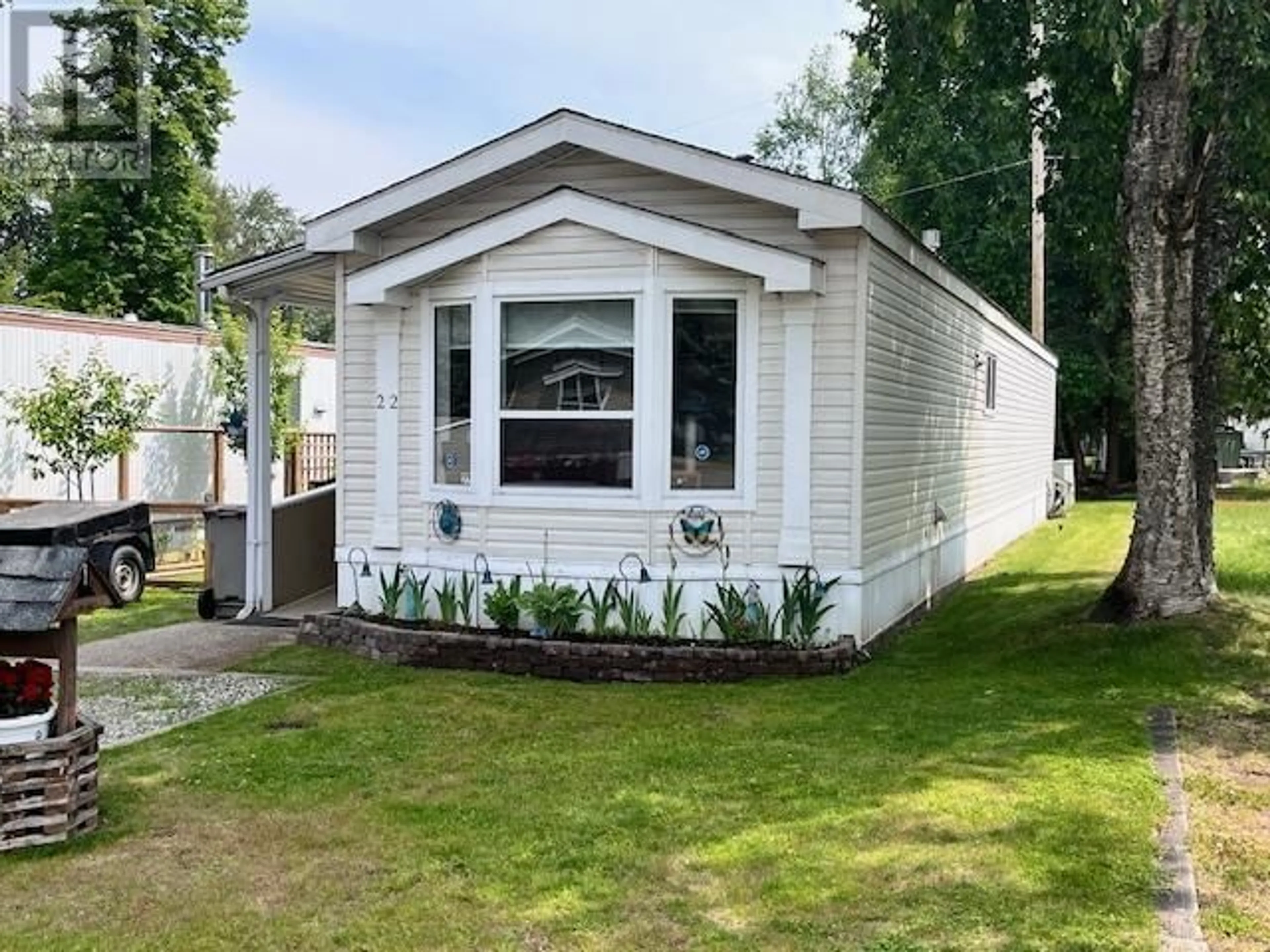 Home with vinyl exterior material, street for 22 - 654 NORTH FRASER DRIVE, Quesnel British Columbia V2J1Z6