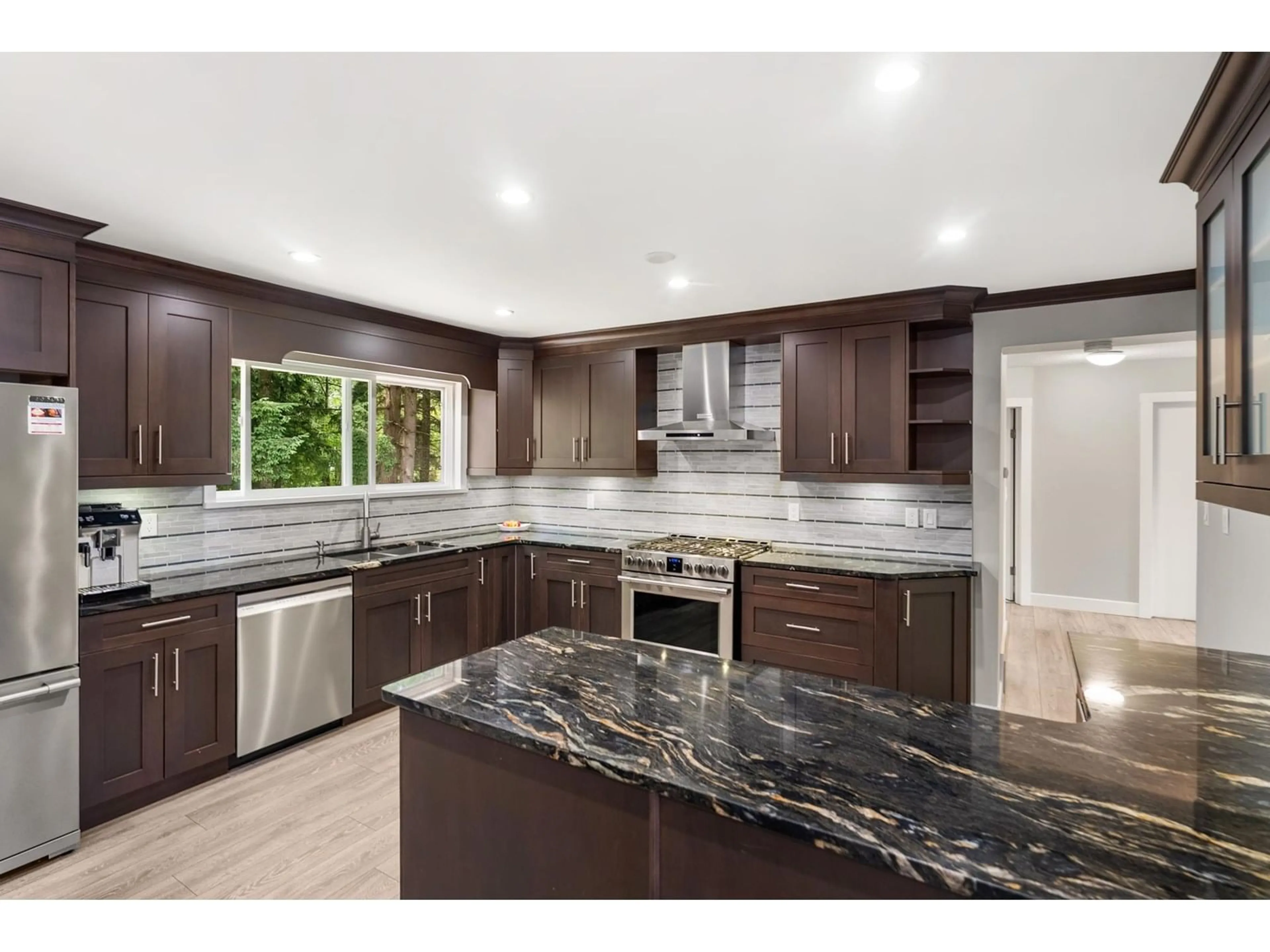 Open concept kitchen, ceramic/tile floor for 7441 113, Delta British Columbia V4C5B2