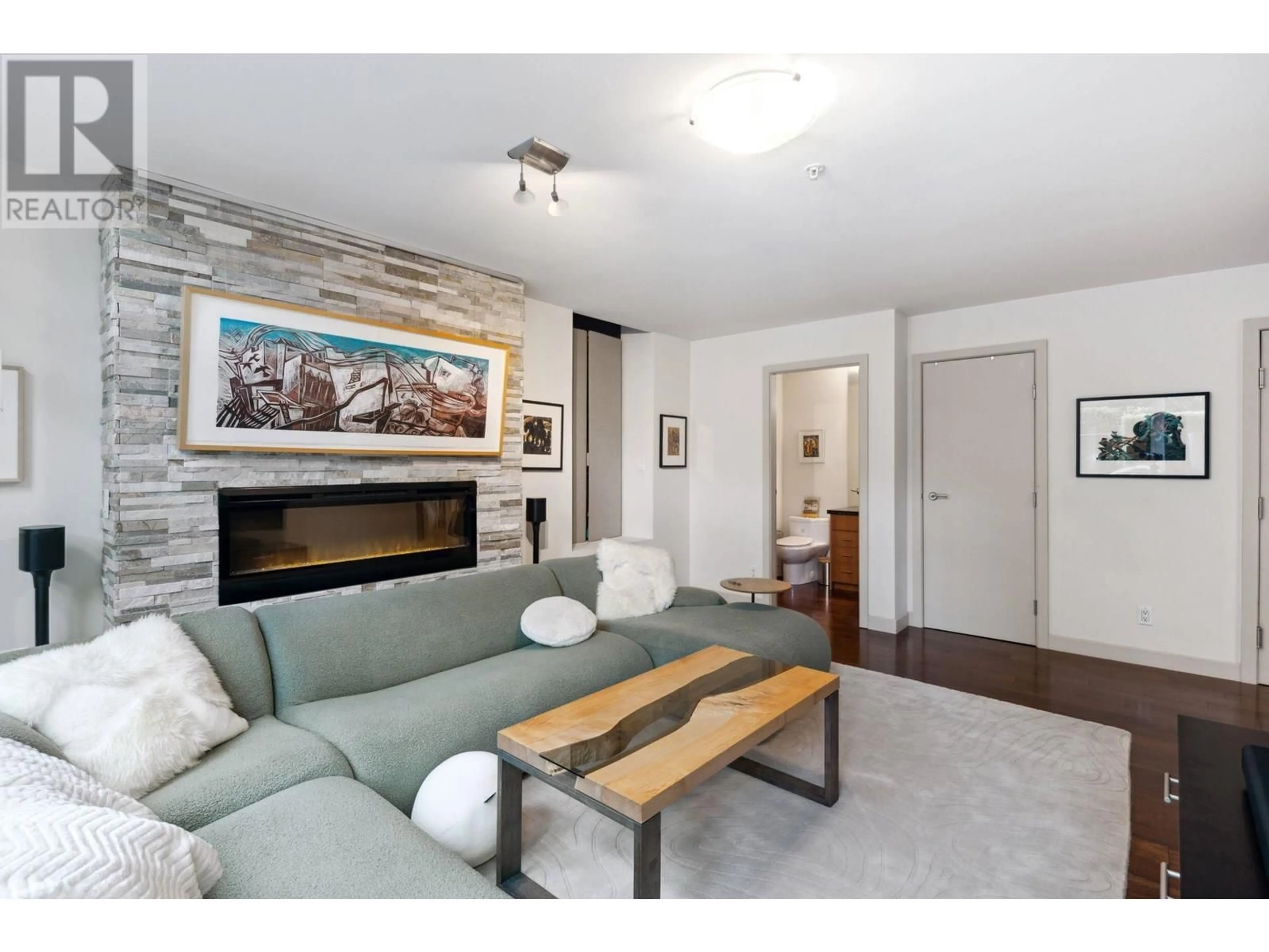 Living room with furniture, wood/laminate floor for TH12 - 1233 CORDOVA STREET, Vancouver British Columbia V6C3R1