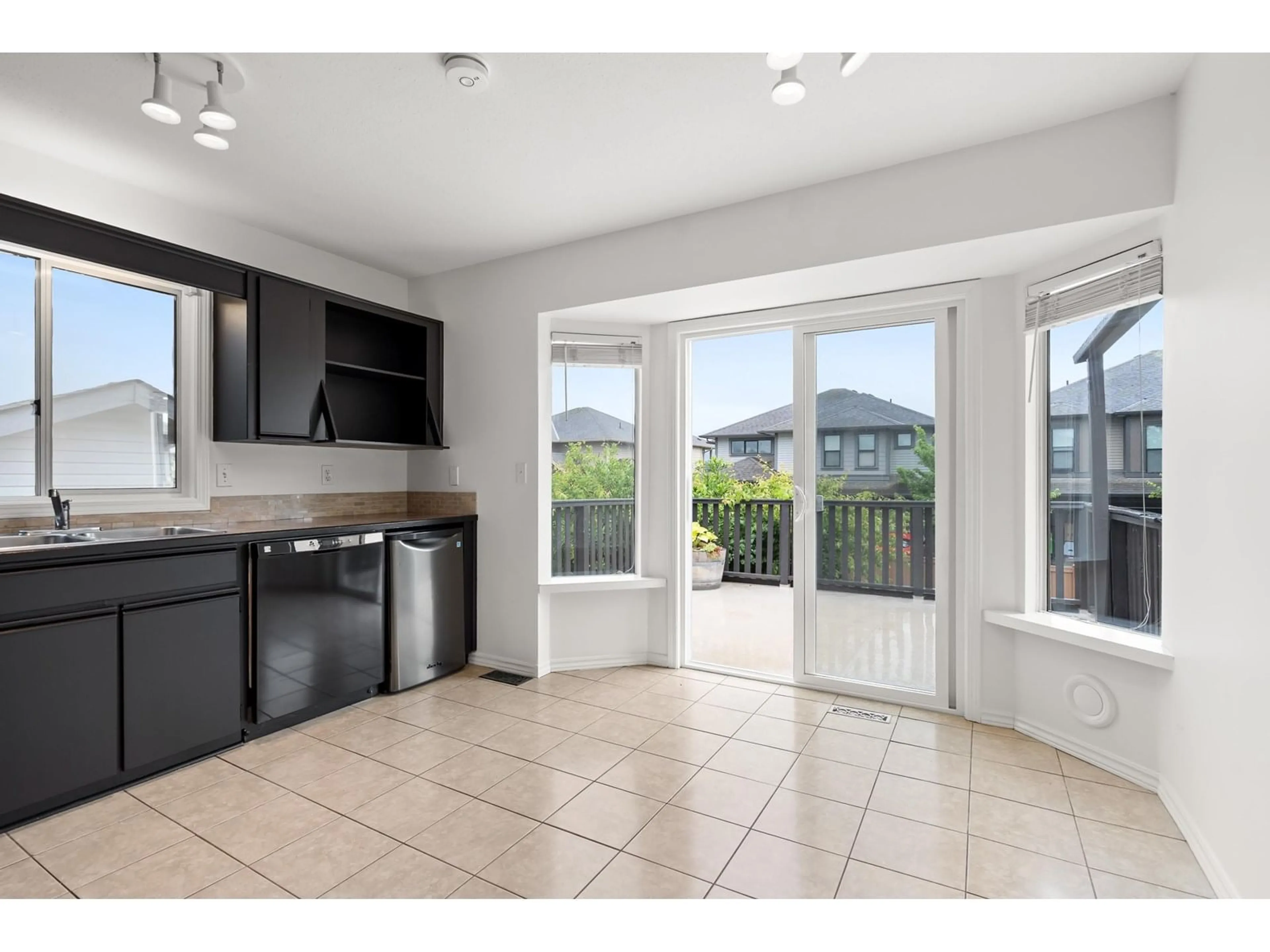 Open concept kitchen, ceramic/tile floor for 45130 BLUEJAY AVENUE, Chilliwack British Columbia V2R2V2