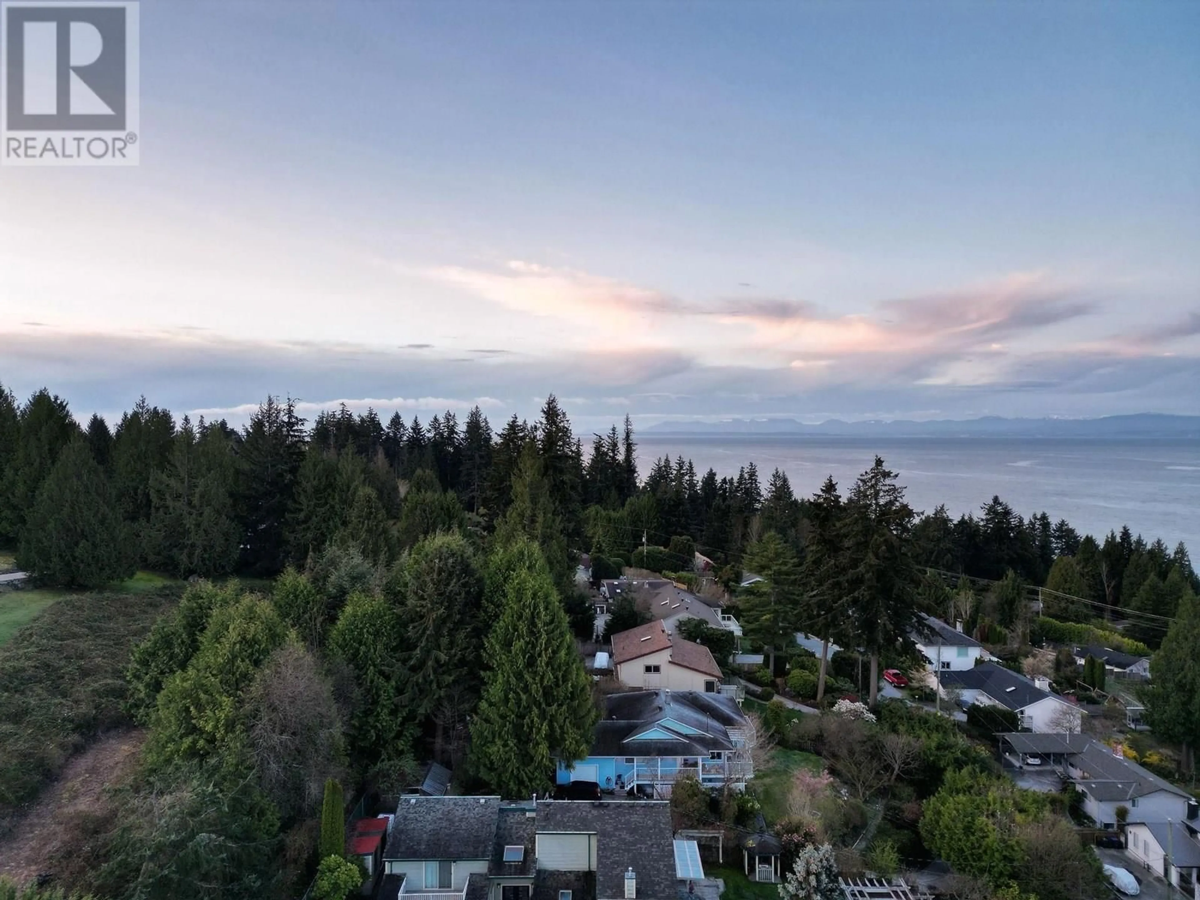 A pic from outside/outdoor area/front of a property/back of a property/a pic from drone, water/lake/river/ocean view for 5174 RADCLIFFE ROAD, Sechelt British Columbia V7Z0C1