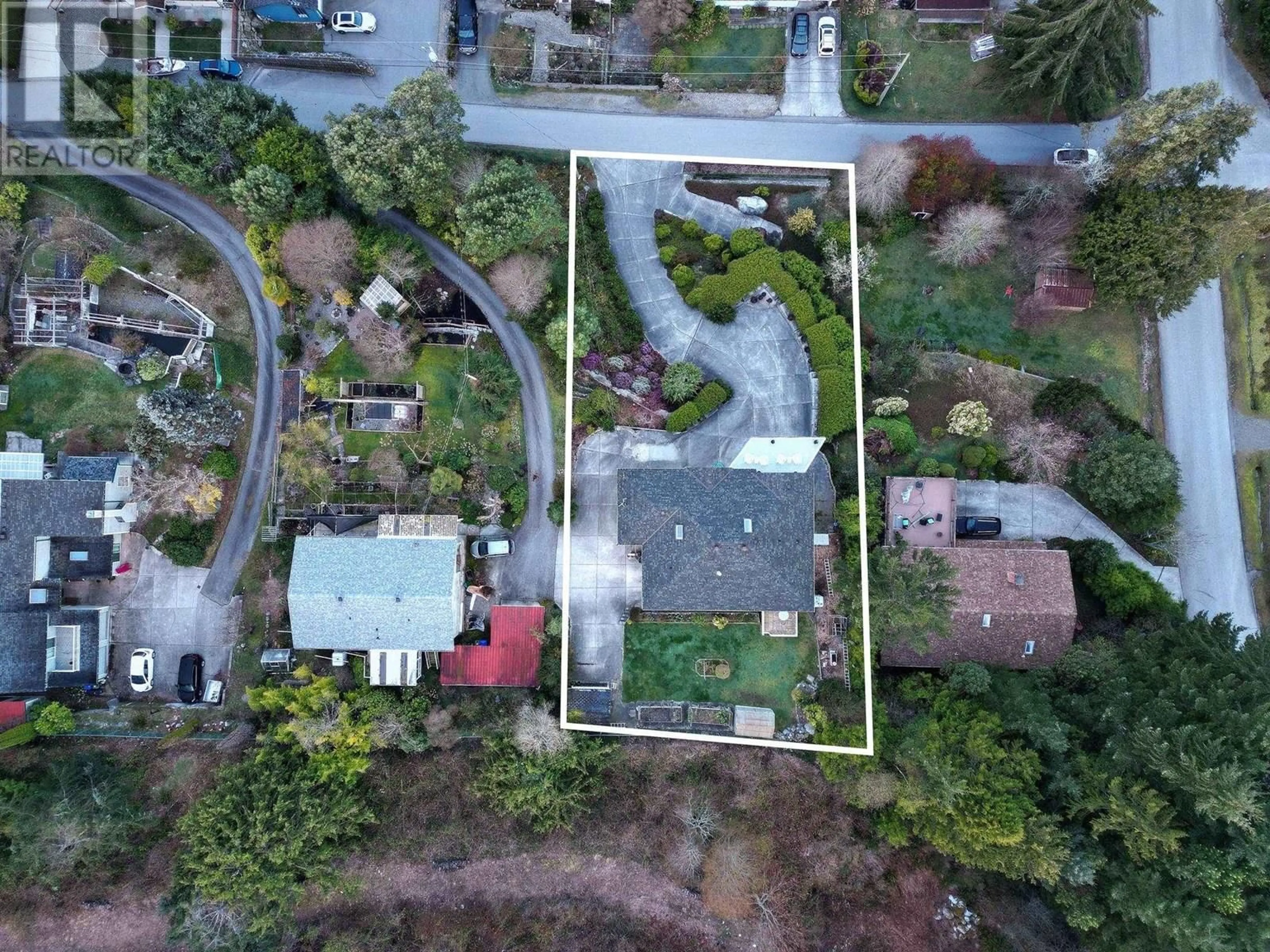 A pic from outside/outdoor area/front of a property/back of a property/a pic from drone, street for 5174 RADCLIFFE ROAD, Sechelt British Columbia V7Z0C1