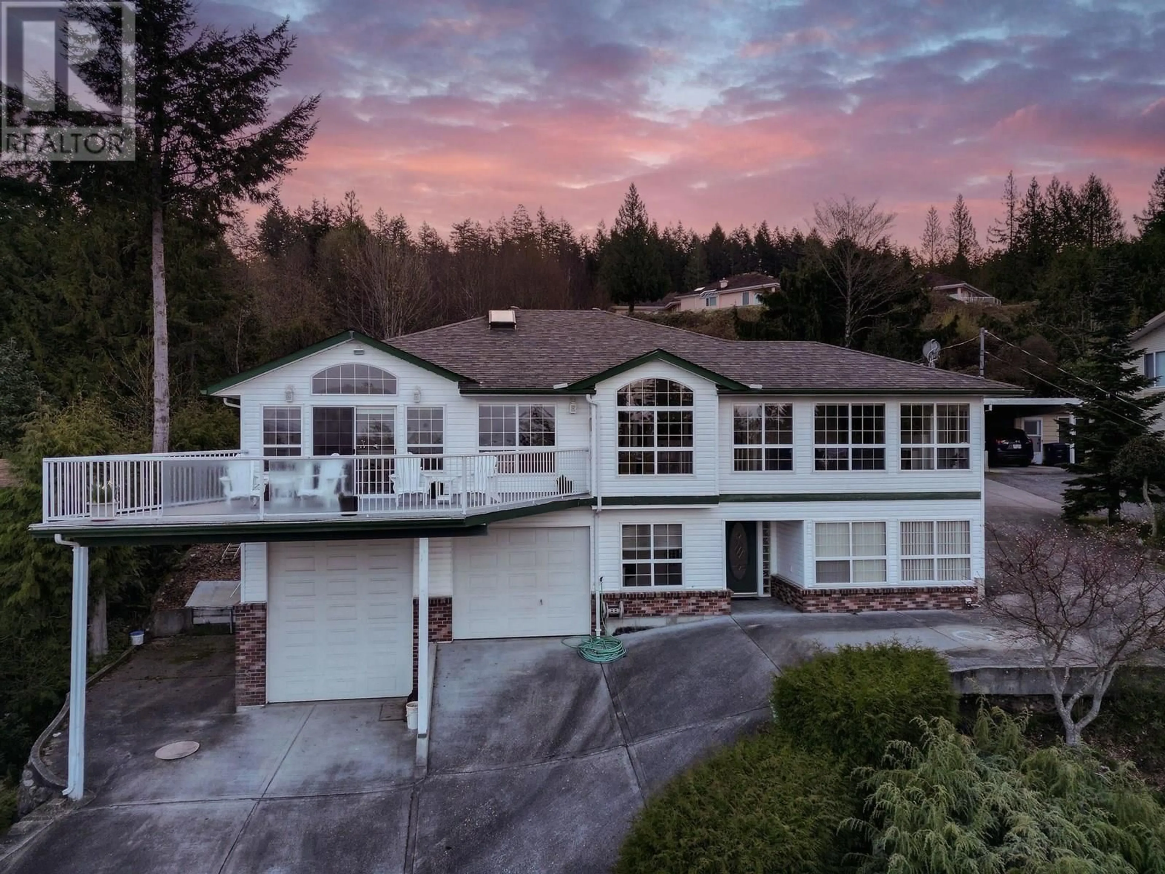 A pic from outside/outdoor area/front of a property/back of a property/a pic from drone, unknown for 5174 RADCLIFFE ROAD, Sechelt British Columbia V7Z0C1