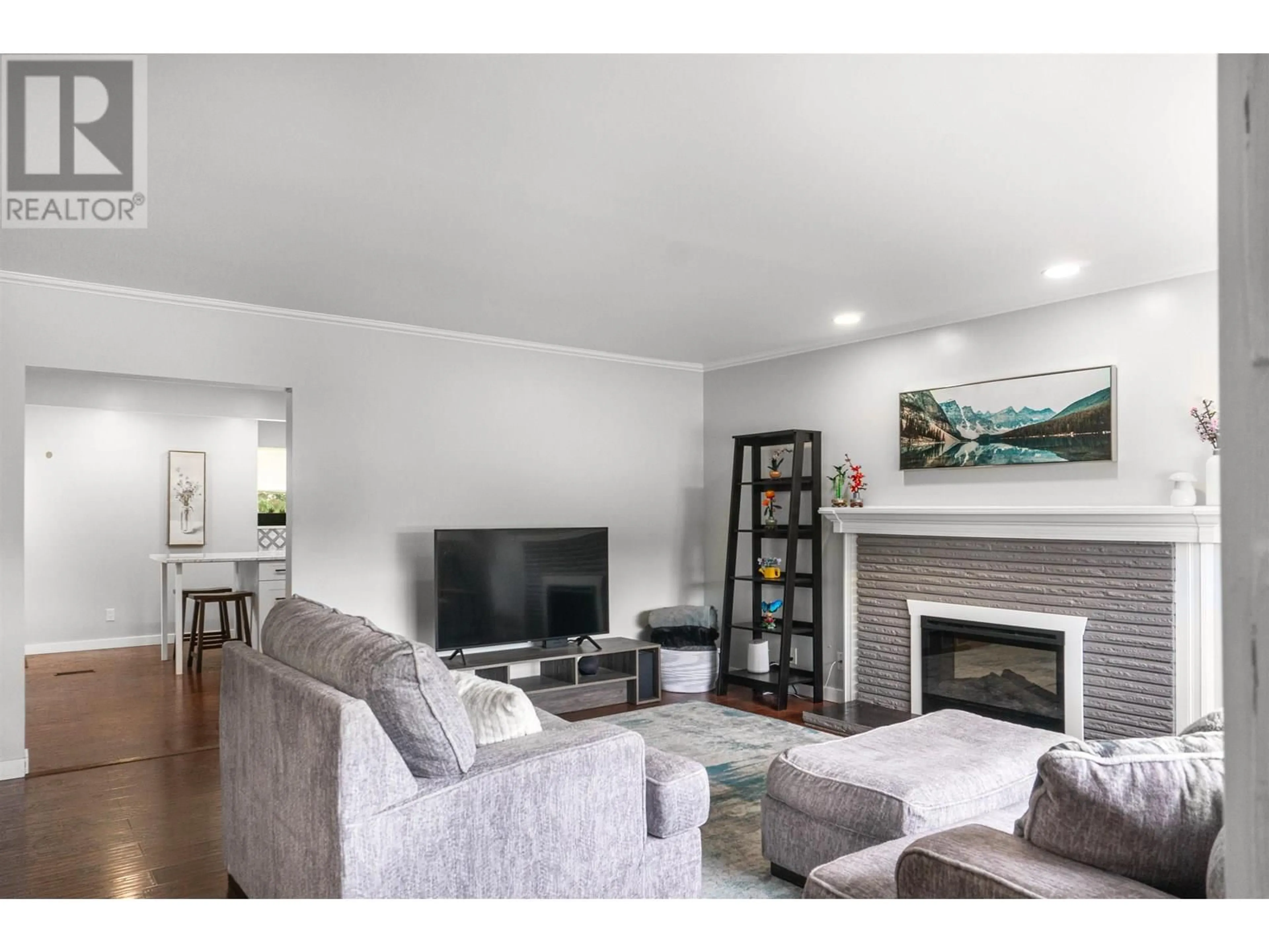 Living room with furniture, wood/laminate floor for 1405 CORMORANT AVENUE, Kitimat British Columbia V8C1R7