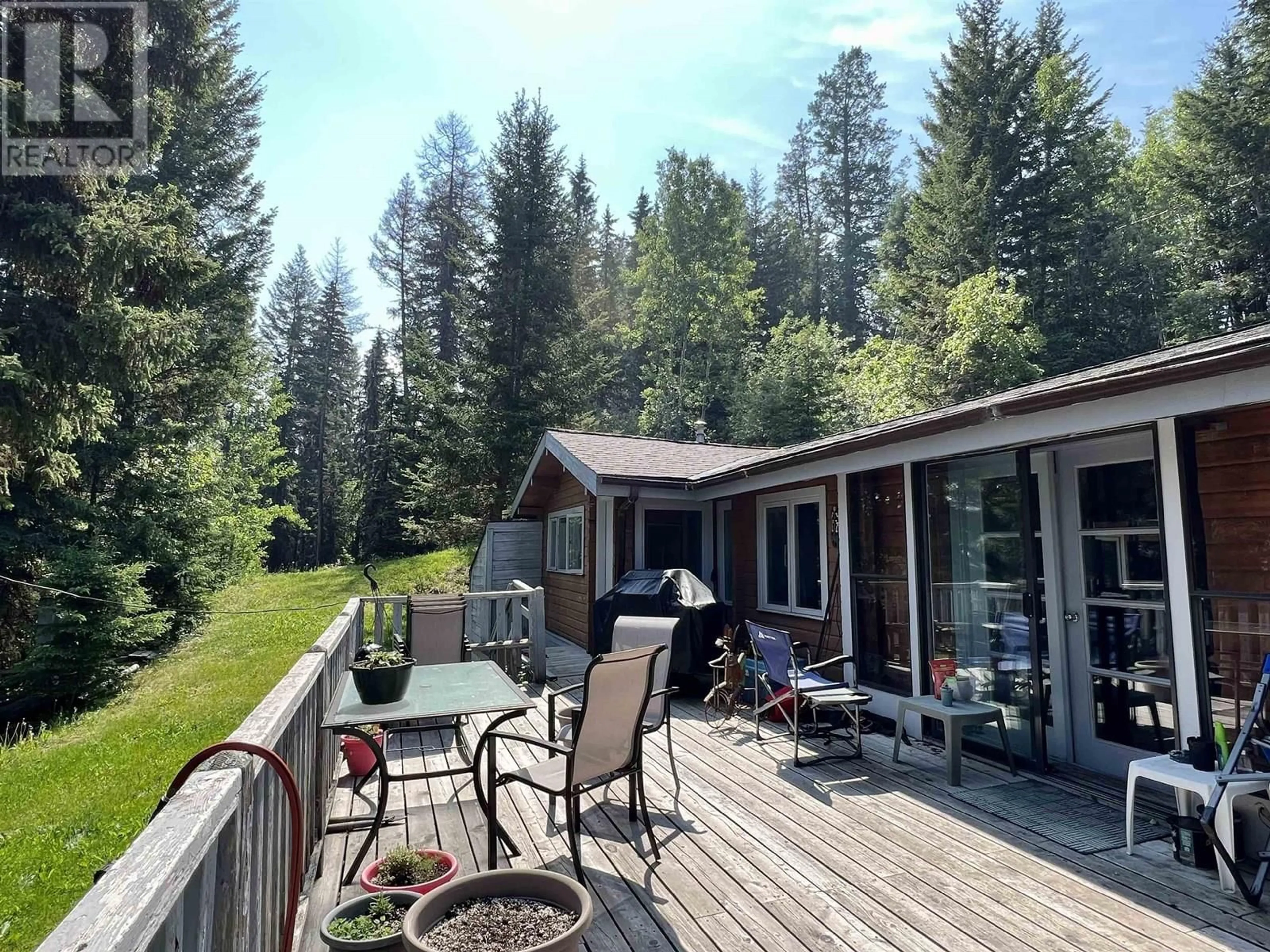 Patio, forest/trees view for 6088 NORMAN ROAD, 100 Mile House British Columbia V0K2E3
