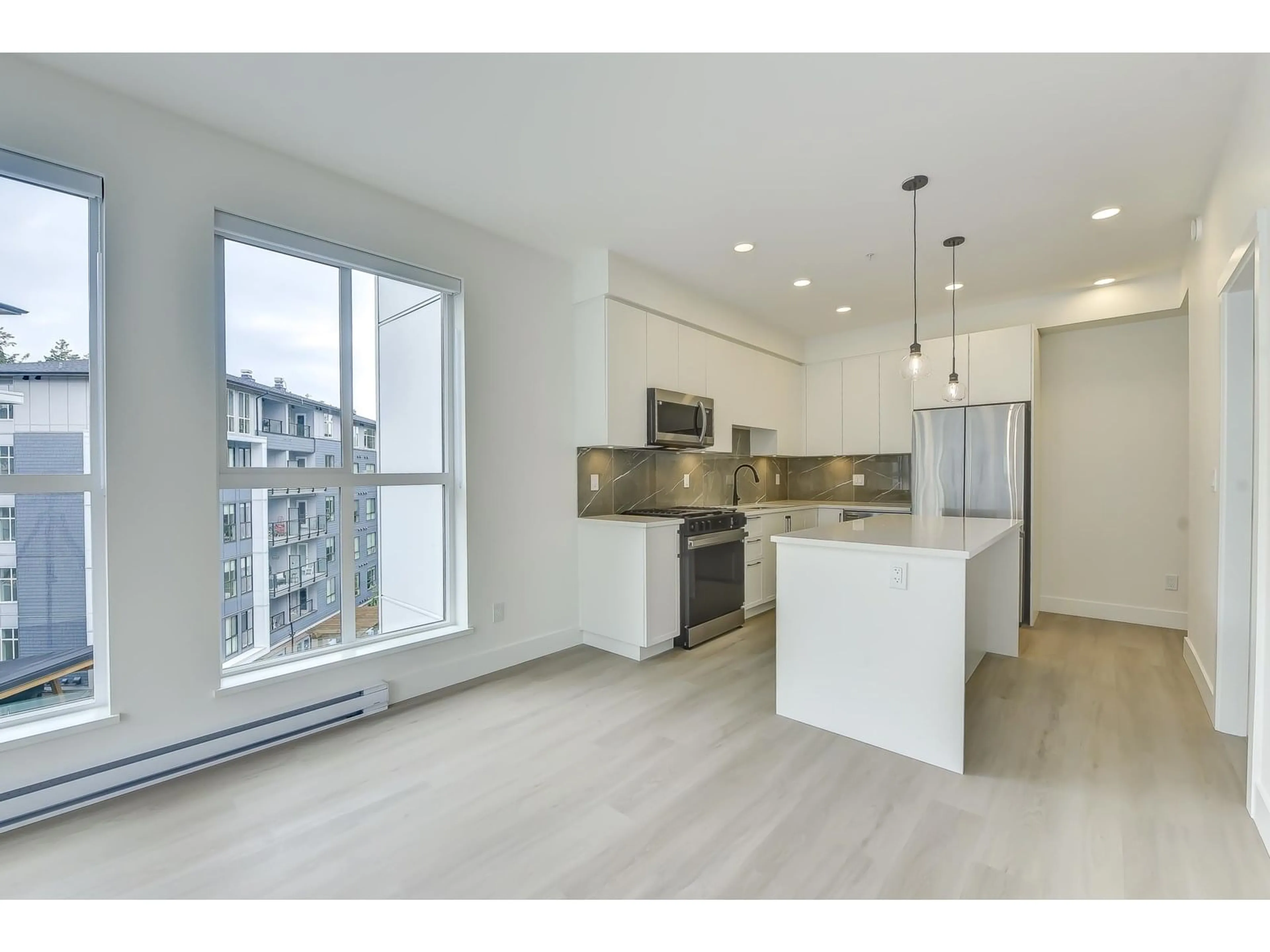 Open concept kitchen, unknown for 522 - 3480 146A, Surrey British Columbia V4P0H4