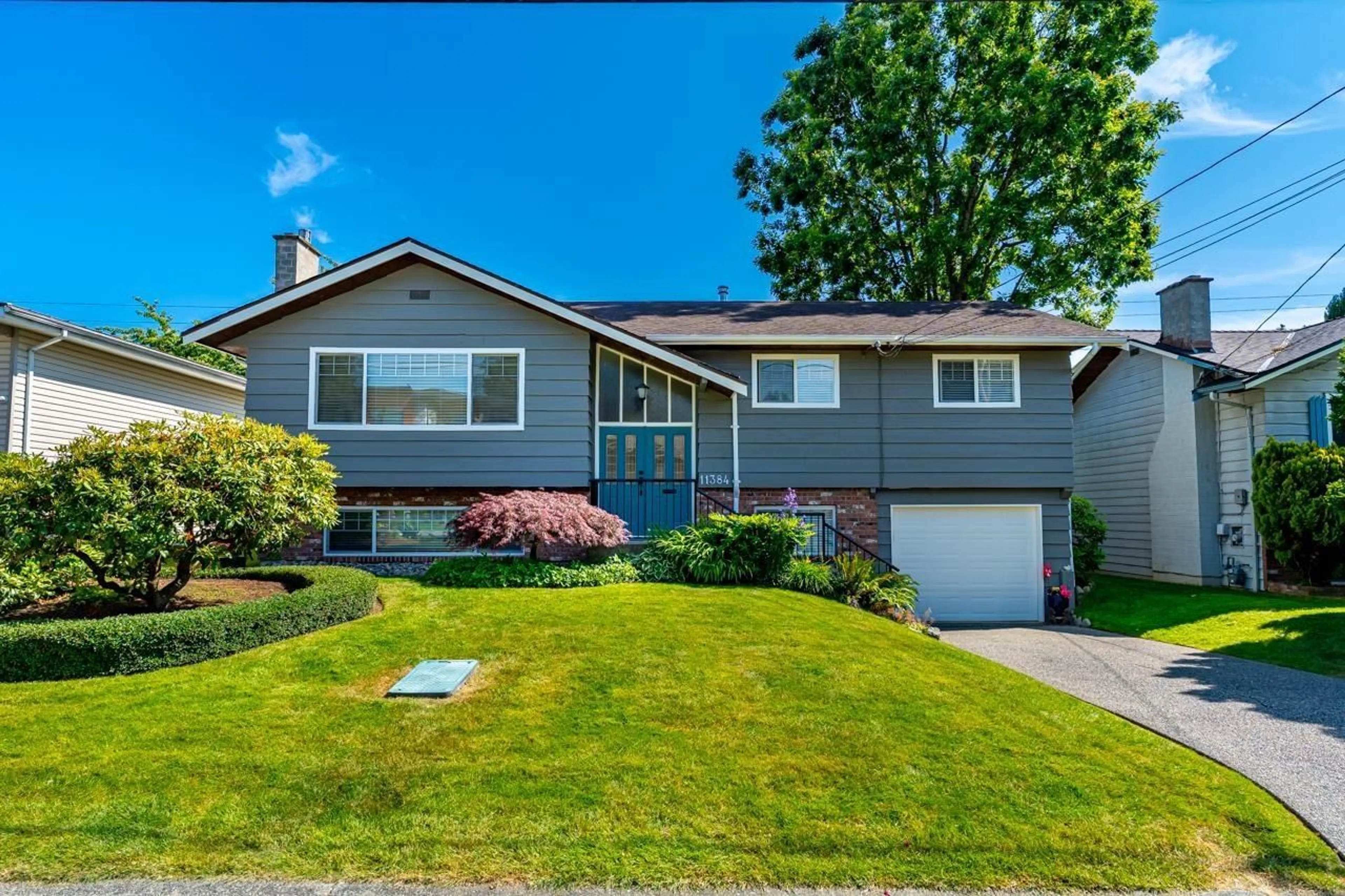 Home with vinyl exterior material, street for 11384 74, Delta British Columbia V4C1E1
