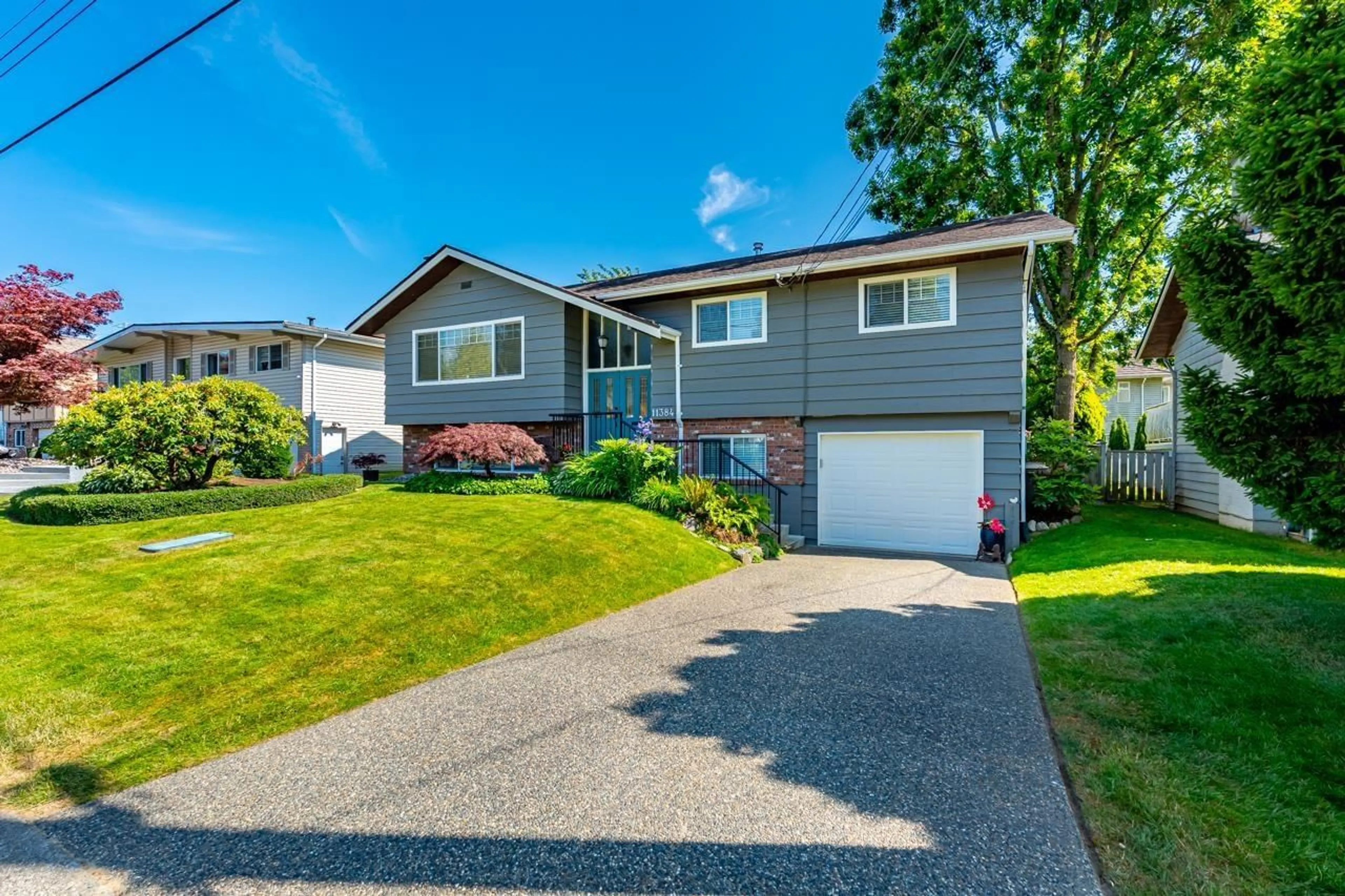 Home with vinyl exterior material, street for 11384 74, Delta British Columbia V4C1E1