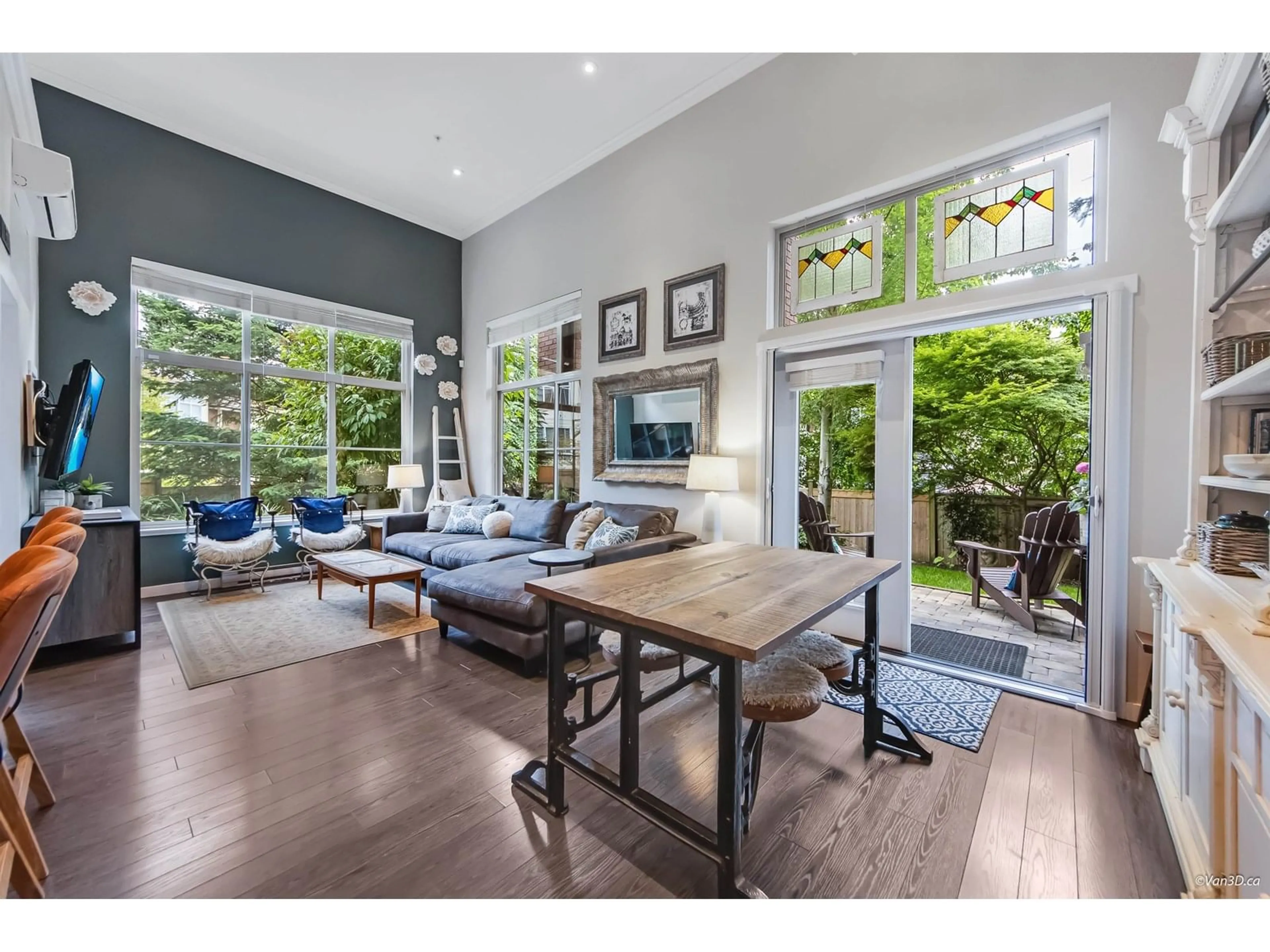 Living room with furniture, wood/laminate floor for 105 - 2855 156, Surrey British Columbia V3Z3Y3