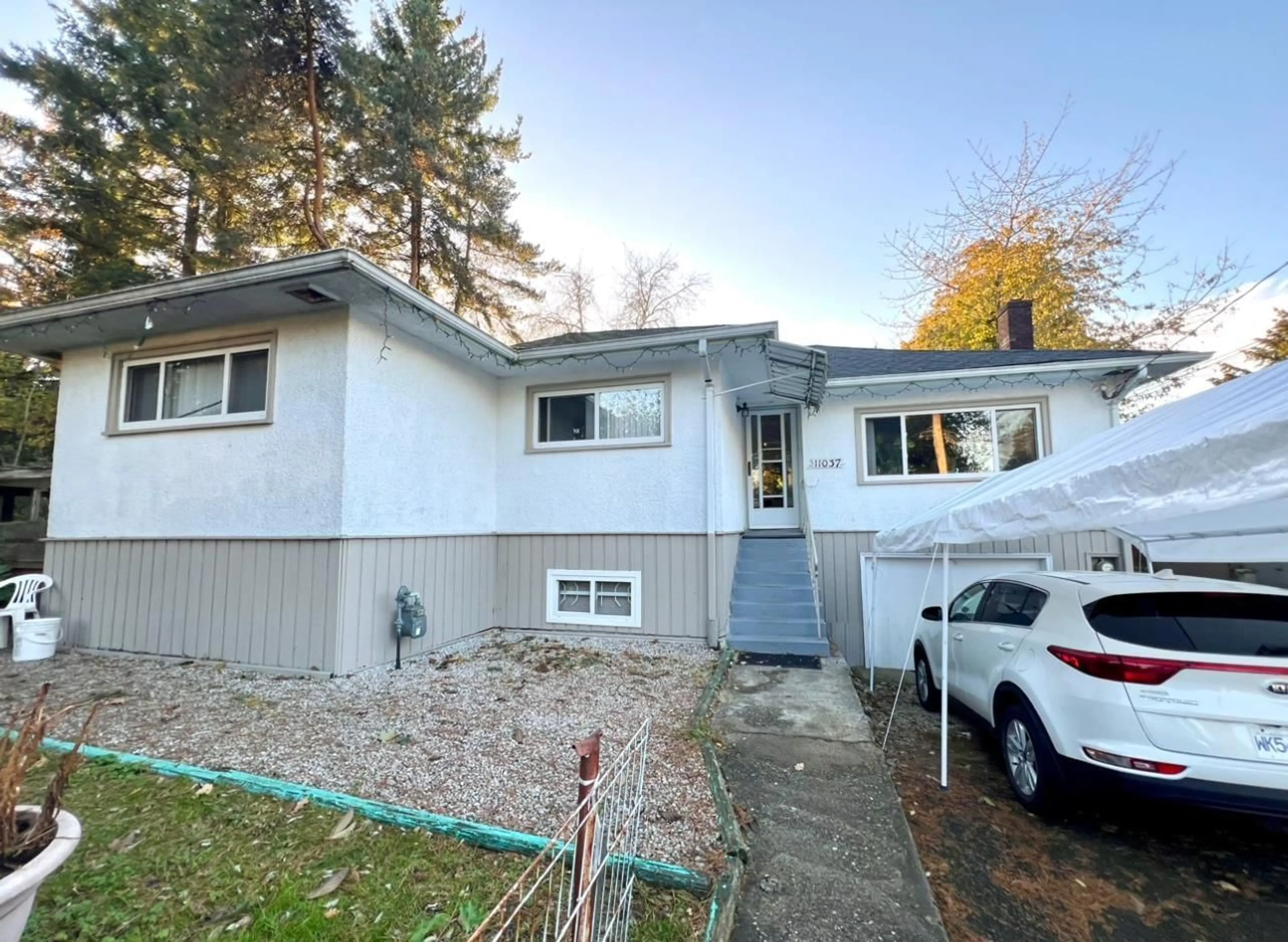 Home with vinyl exterior material, street for 11037 131, Surrey British Columbia V3T3P8