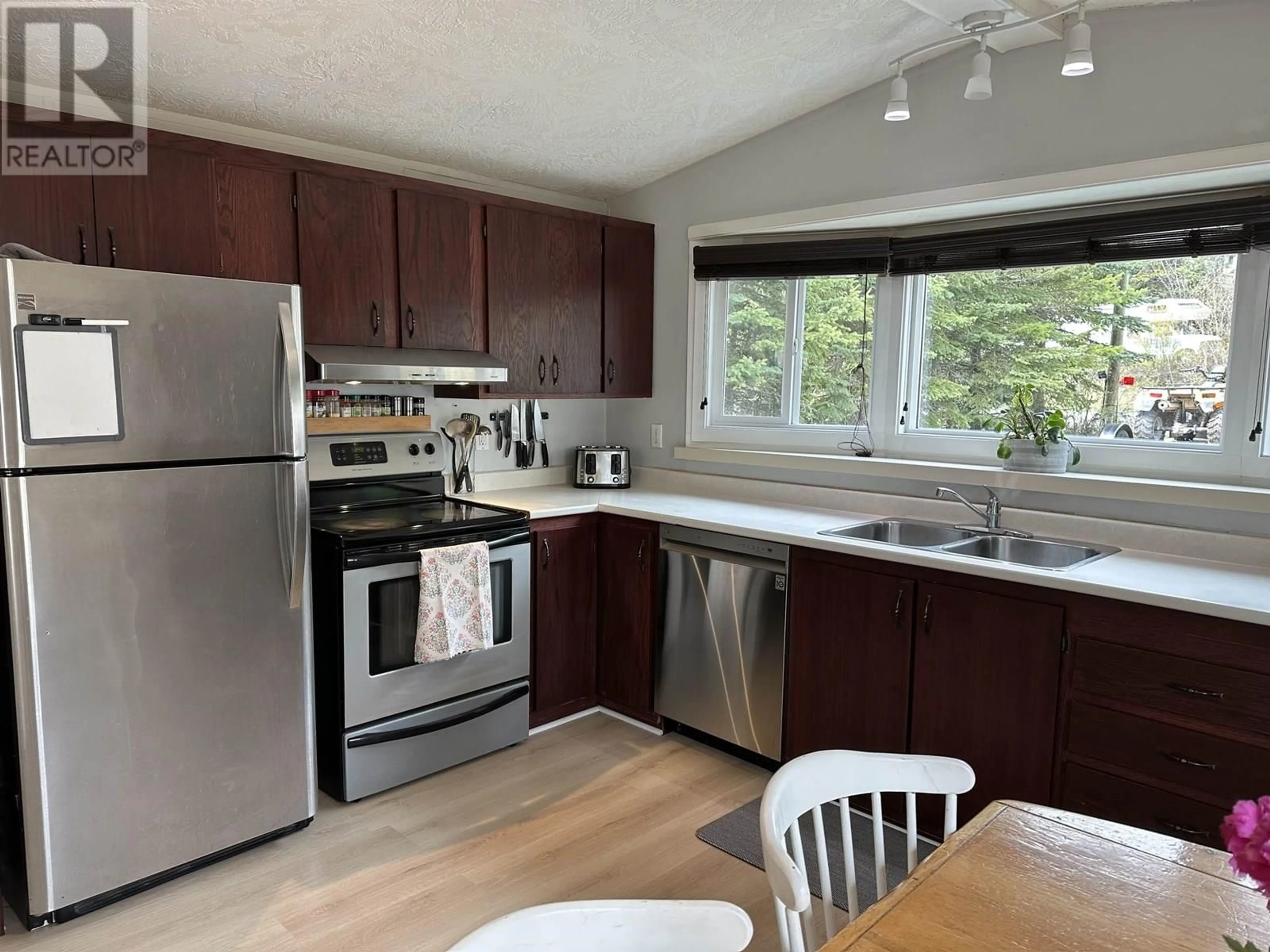Standard kitchen, wood/laminate floor for 2054 SOMERVILLE ROAD, Prince George British Columbia V2N5B1