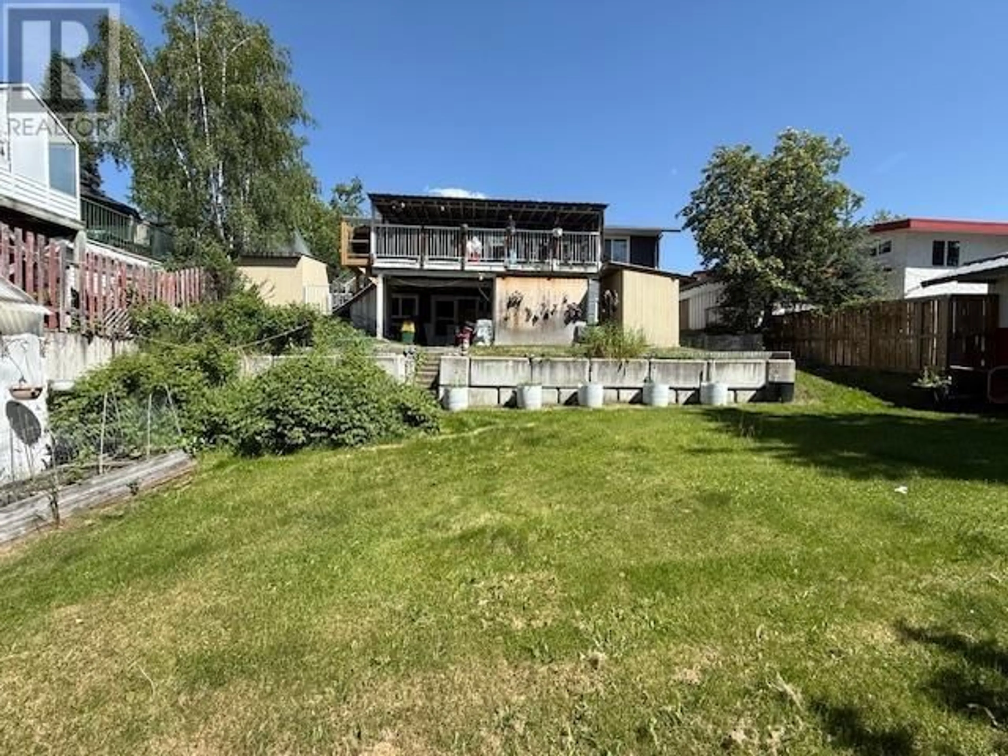 A pic from outside/outdoor area/front of a property/back of a property/a pic from drone, unknown for 1157 BABINE CRESCENT, Prince George British Columbia V2M3X7