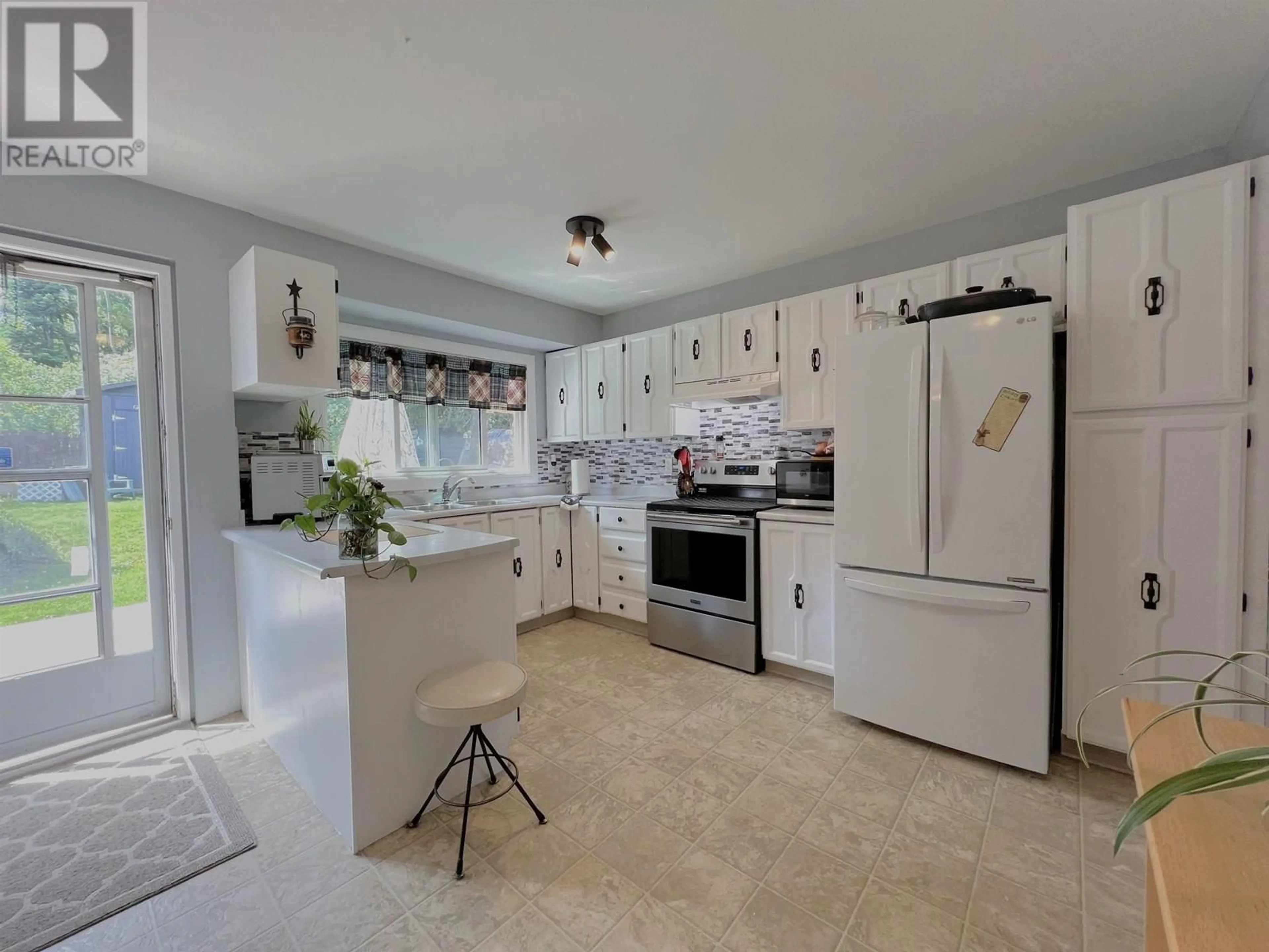 Open concept kitchen, ceramic/tile floor for 8145 ST LAWRENCE AVENUE, Prince George British Columbia V2N4K6