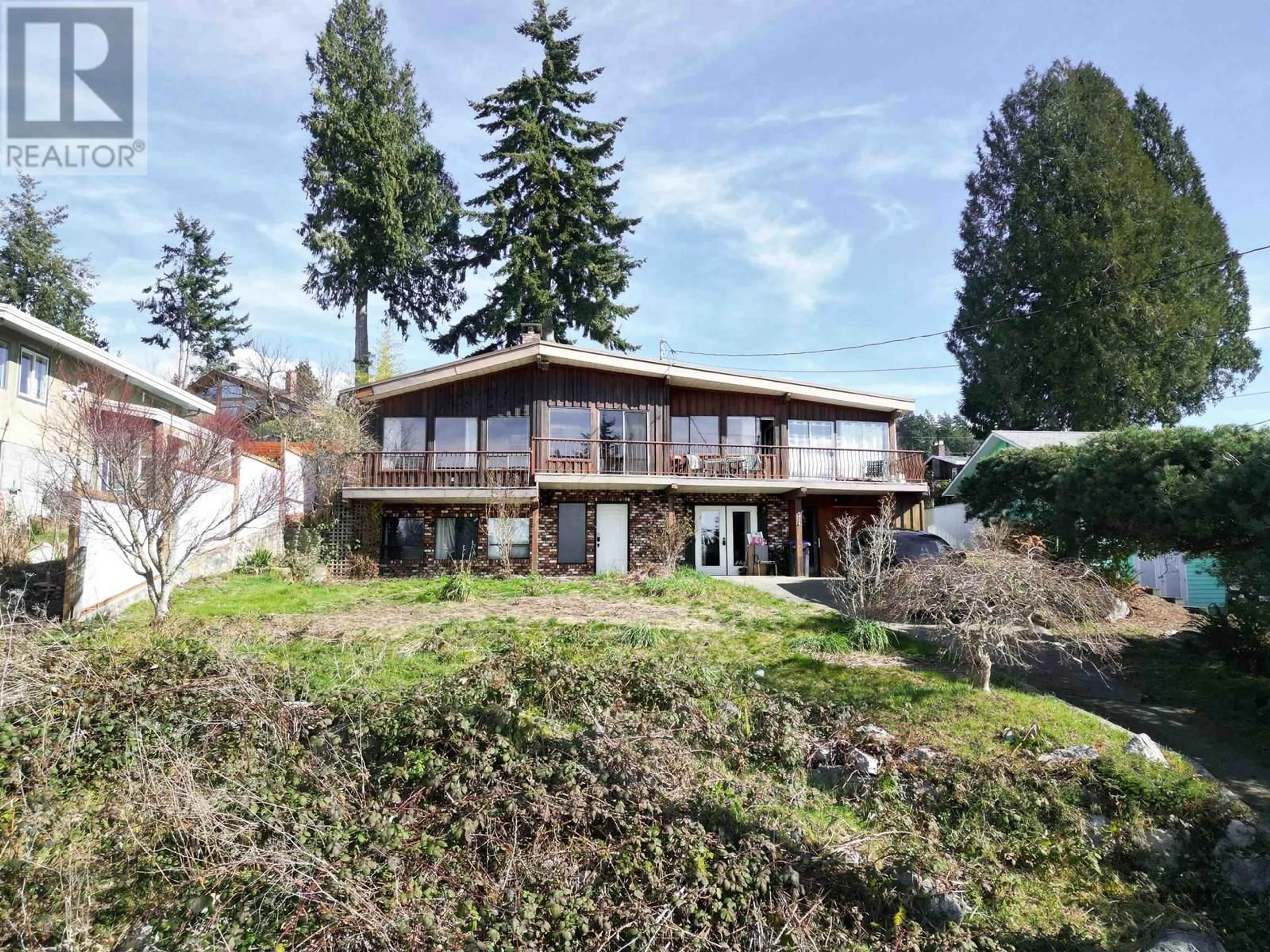 A pic from outside/outdoor area/front of a property/back of a property/a pic from drone, unknown for 4934 GEER ROAD, Sechelt British Columbia V0N3A2