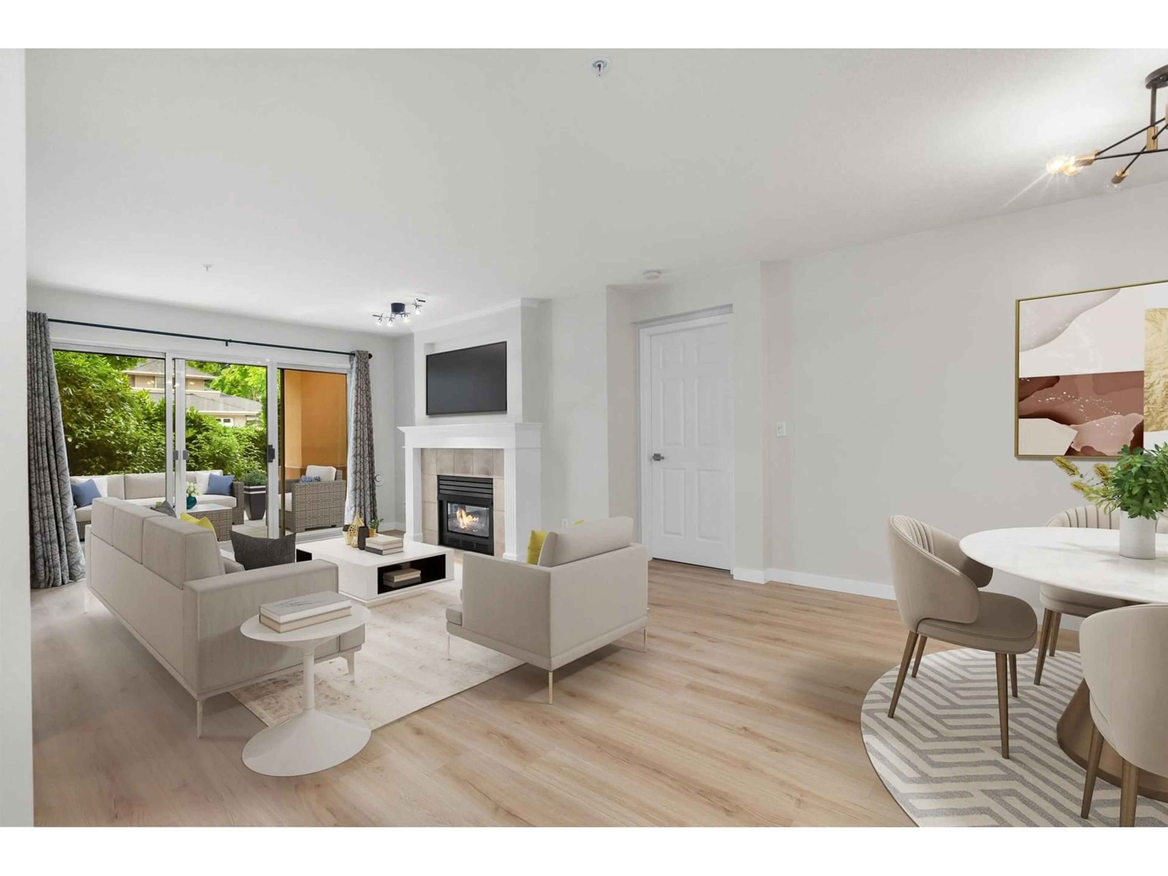 Living room with furniture, wood/laminate floor for 109 - 15155 22, Surrey British Columbia V4A9T4
