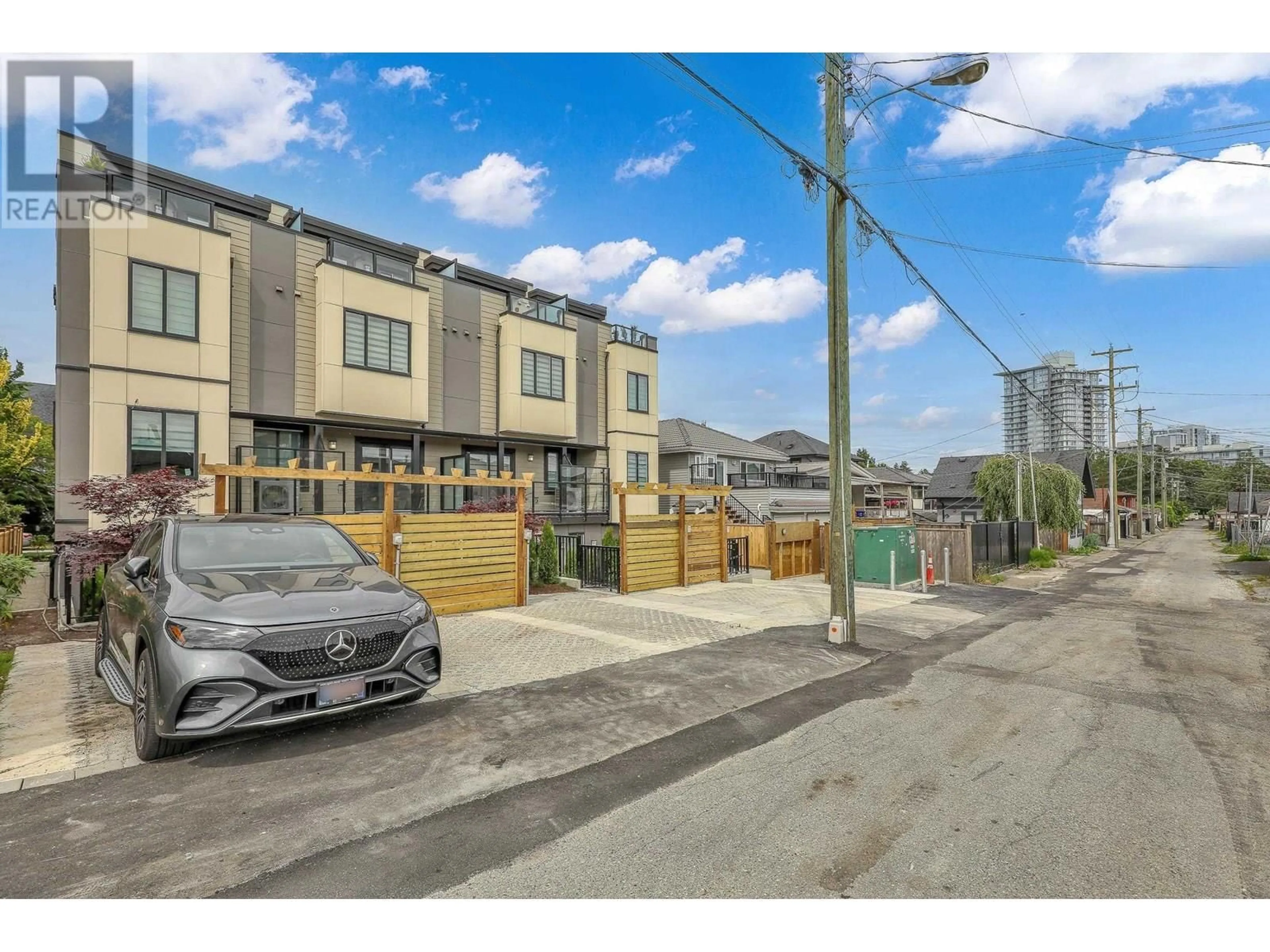 A pic from outside/outdoor area/front of a property/back of a property/a pic from drone, street for 202 - 2122 32ND AVENUE, Vancouver British Columbia V5N3B9