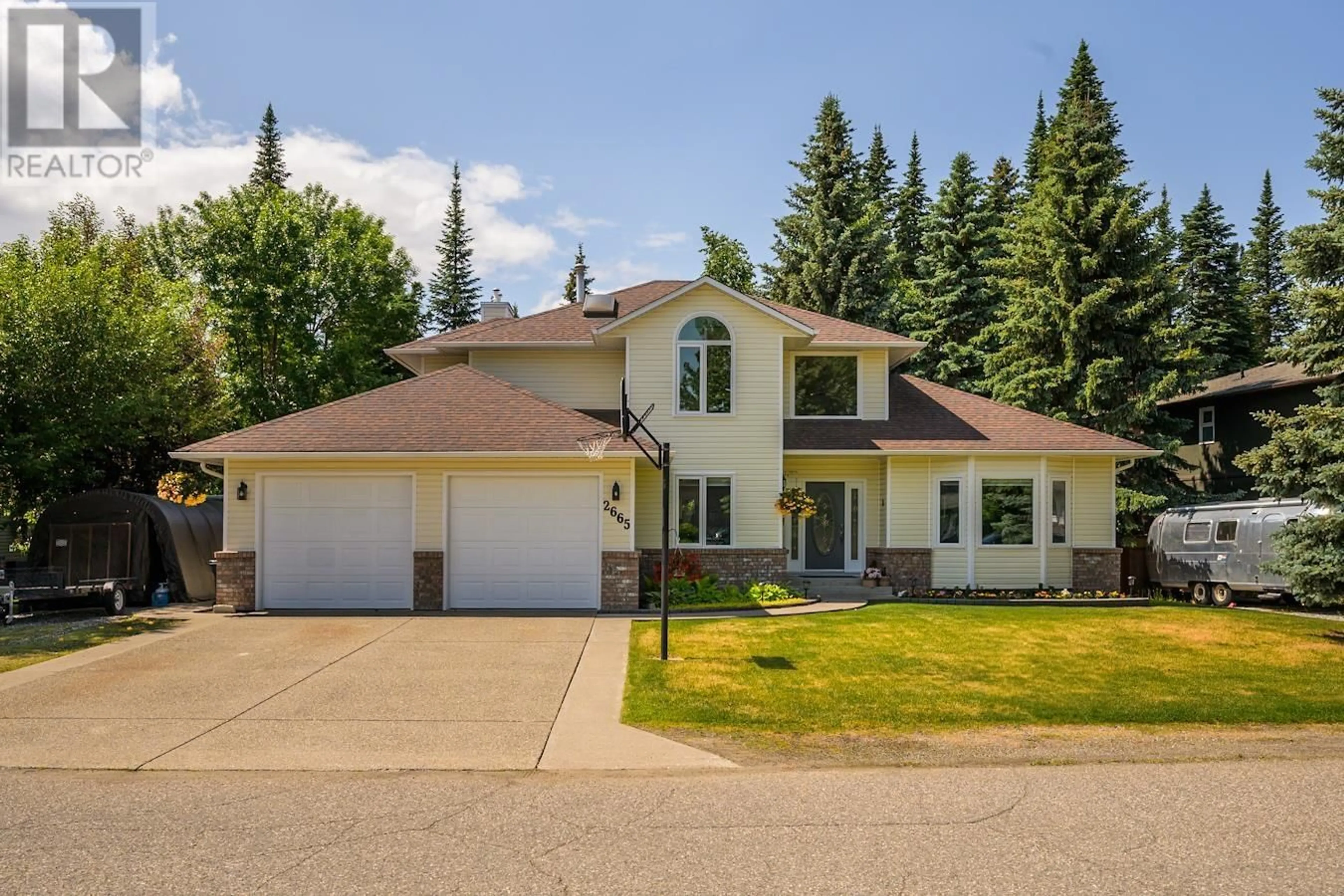 Home with vinyl exterior material, street for 2665 CARLISLE WAY, Prince George British Columbia V2K4B5