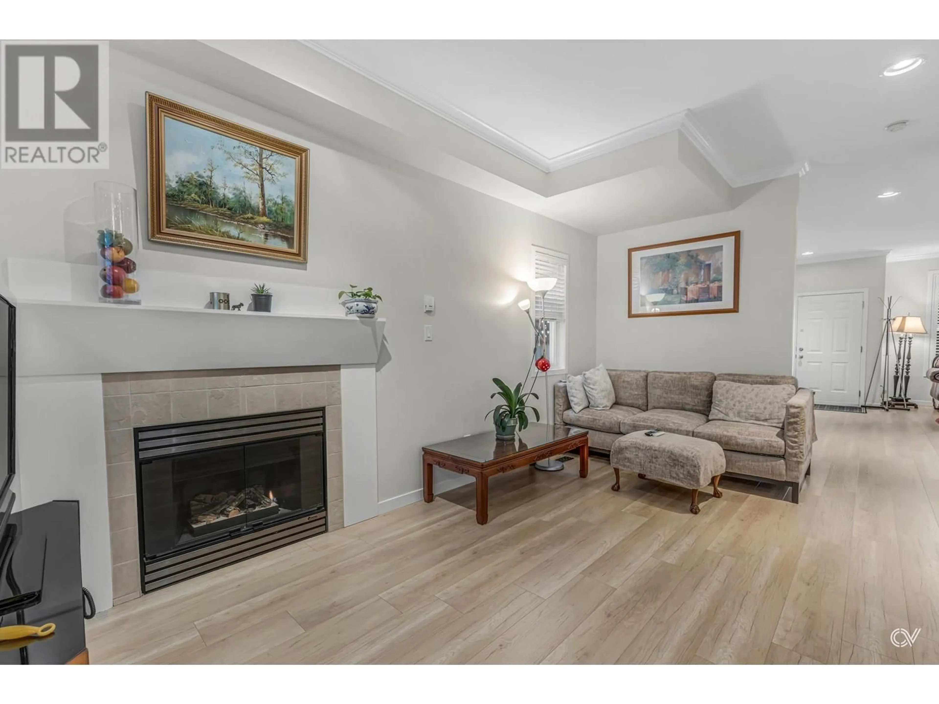 Living room with furniture, wood/laminate floor for 4368 BLAIR DRIVE, Richmond British Columbia V6X4C1