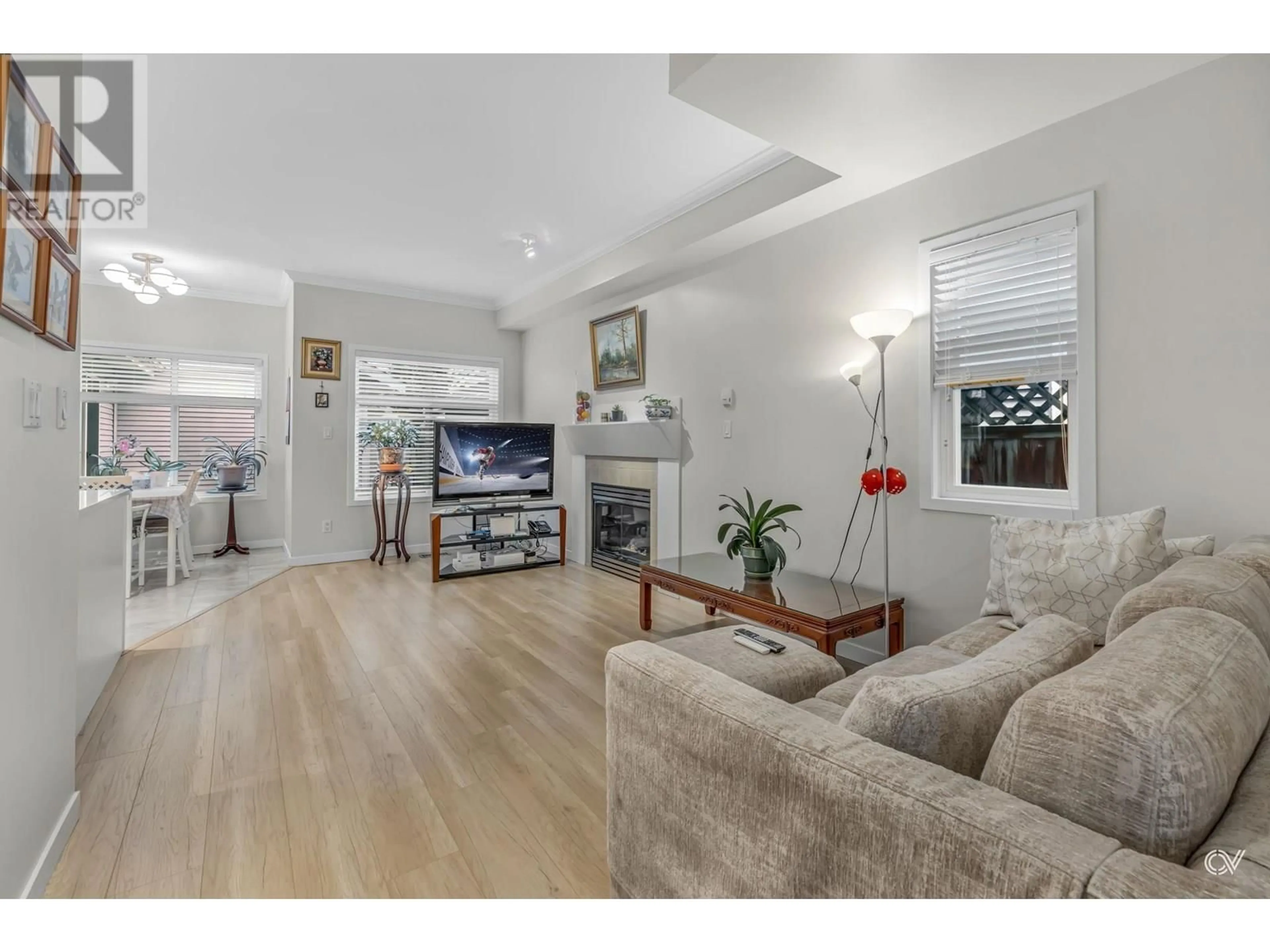 Living room with furniture, wood/laminate floor for 4368 BLAIR DRIVE, Richmond British Columbia V6X4C1