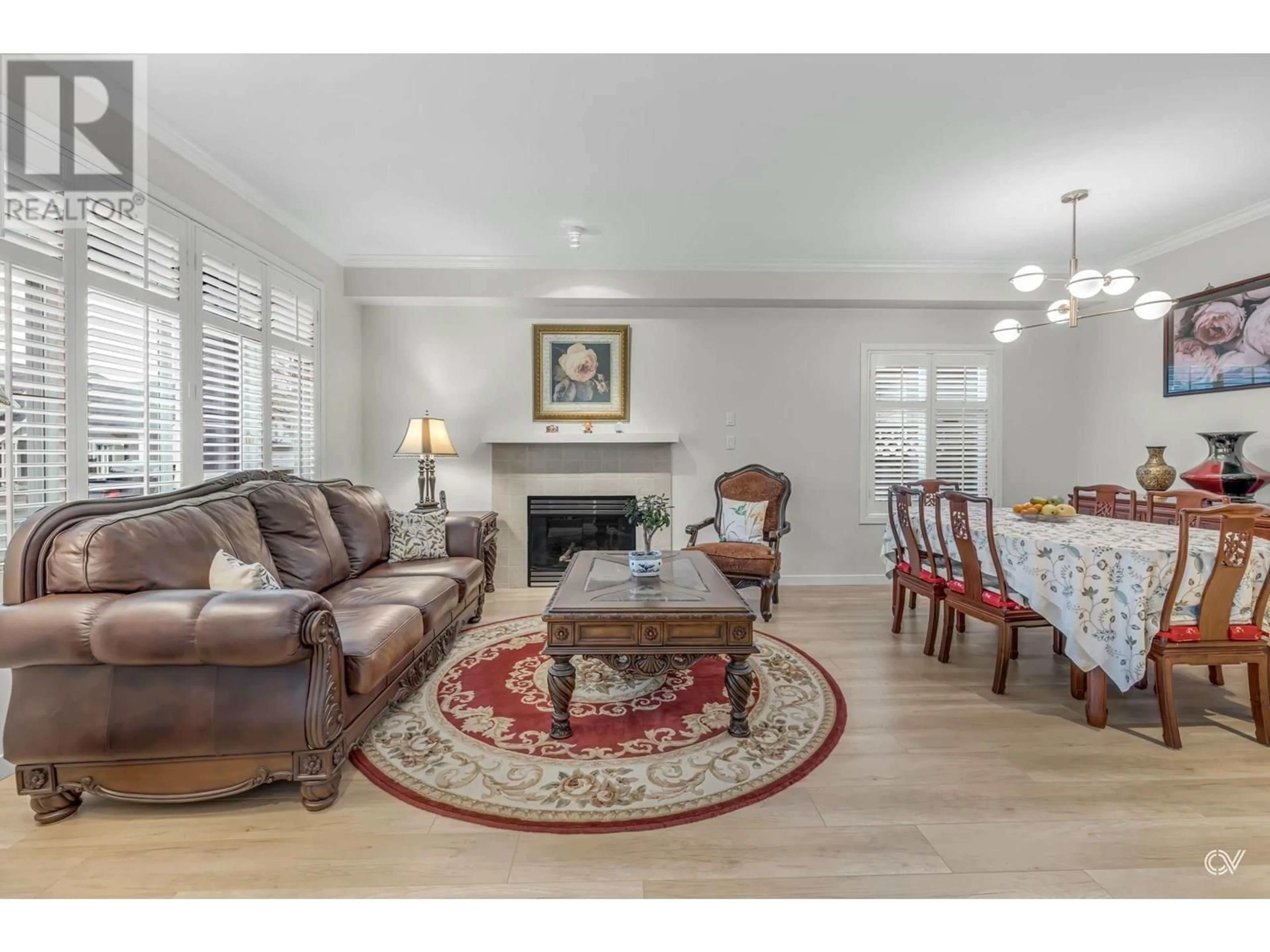 Living room with furniture, wood/laminate floor for 4368 BLAIR DRIVE, Richmond British Columbia V6X4C1