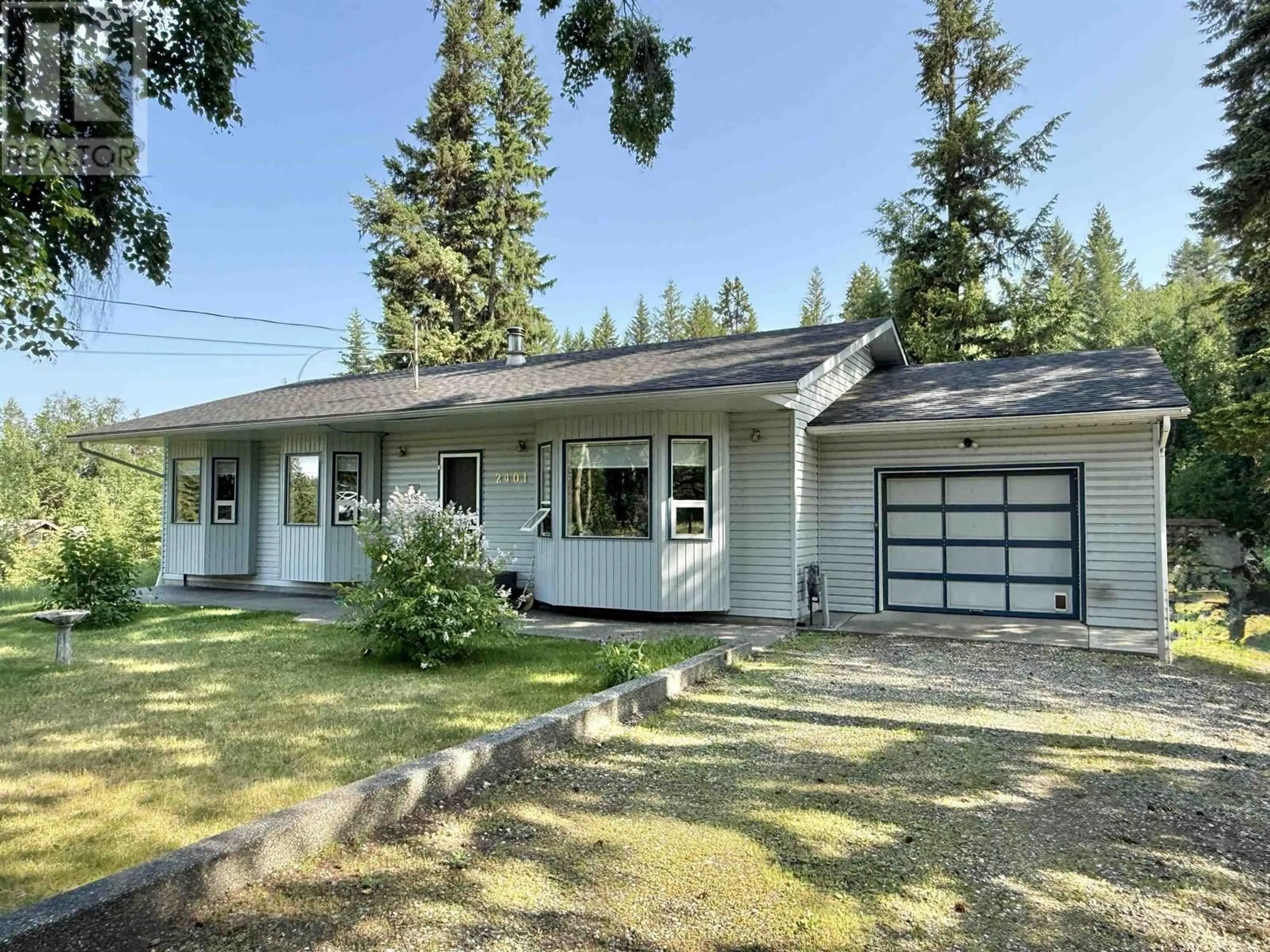 Home with vinyl exterior material, street for 2401 TANOKA ROAD, Quesnel British Columbia V2J7B8