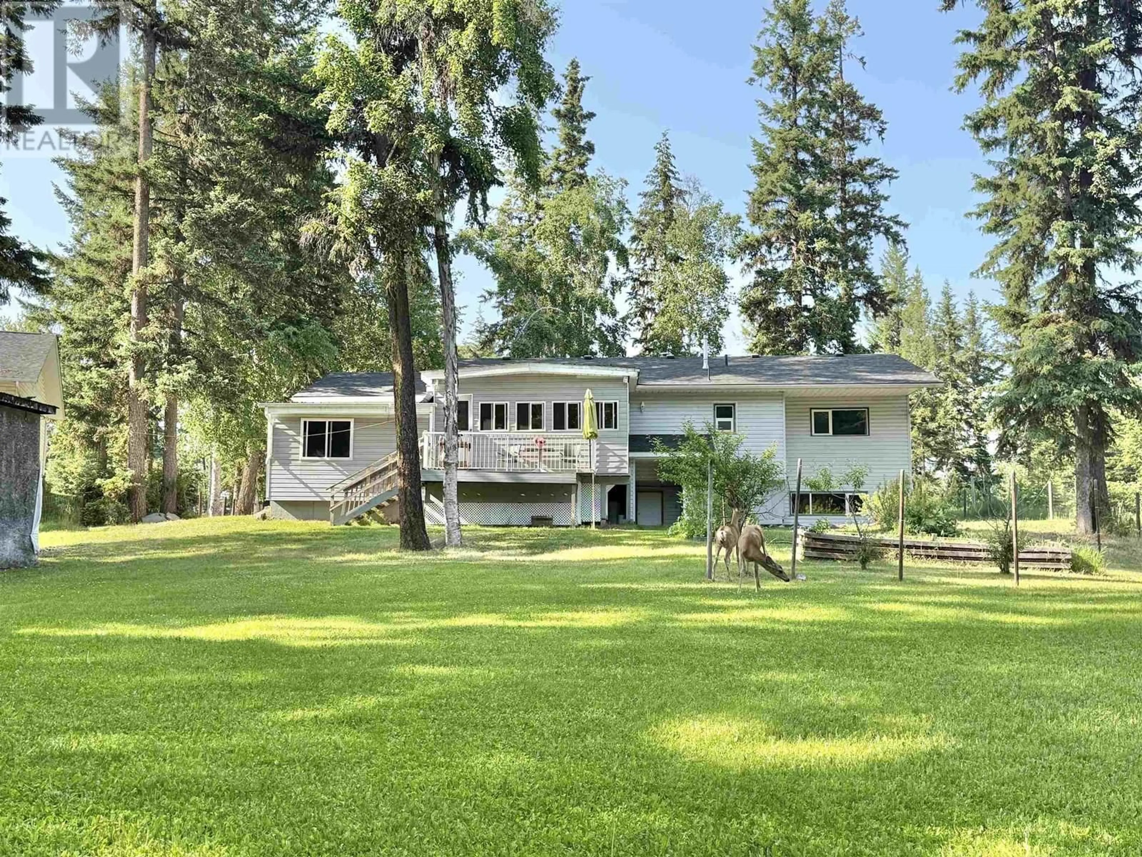 A pic from outside/outdoor area/front of a property/back of a property/a pic from drone, forest/trees view for 2401 TANOKA ROAD, Quesnel British Columbia V2J7B8