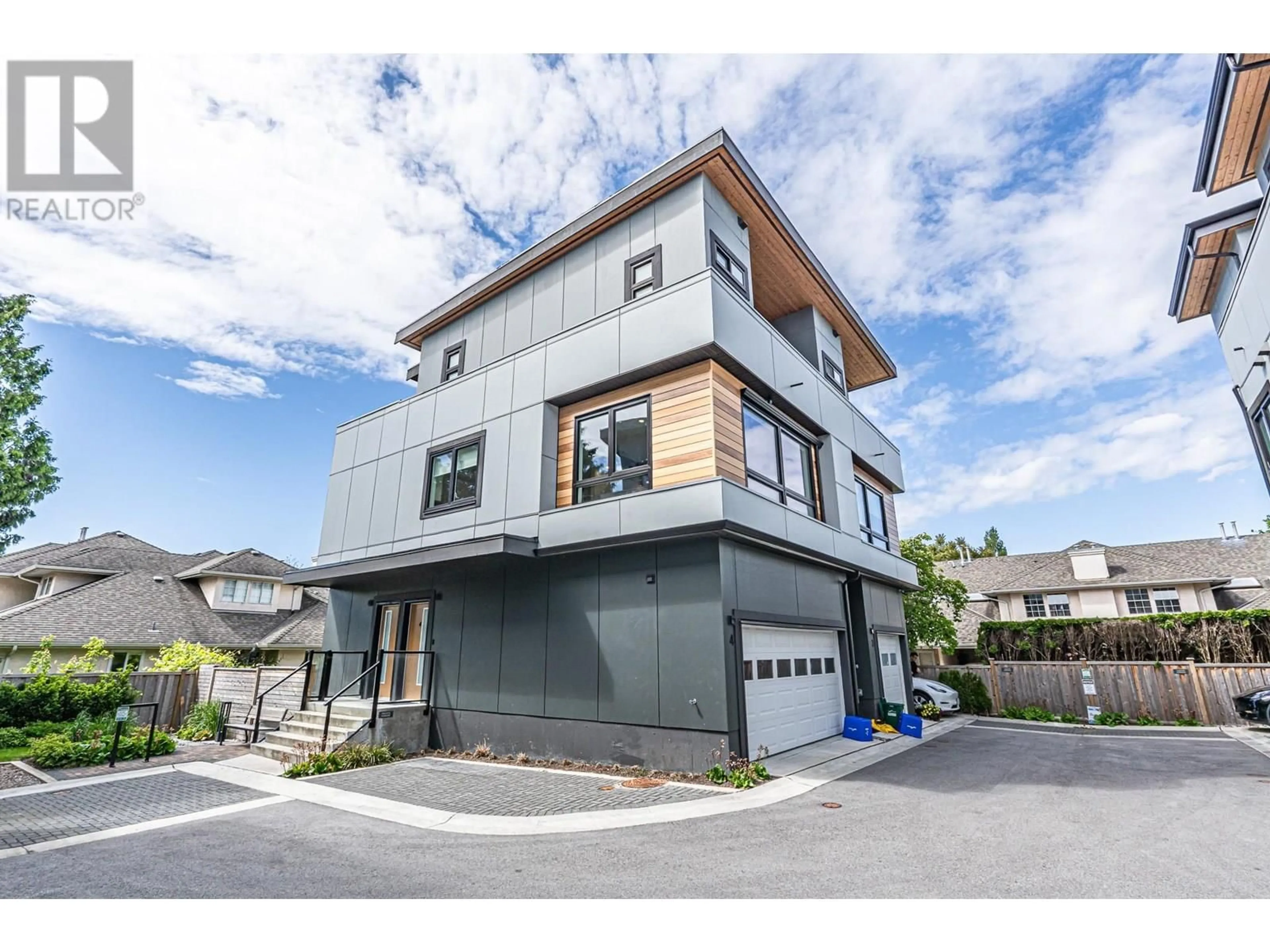 Home with vinyl exterior material, street for 4 - 9099 NO. 2 ROAD, Richmond British Columbia V7E2C6