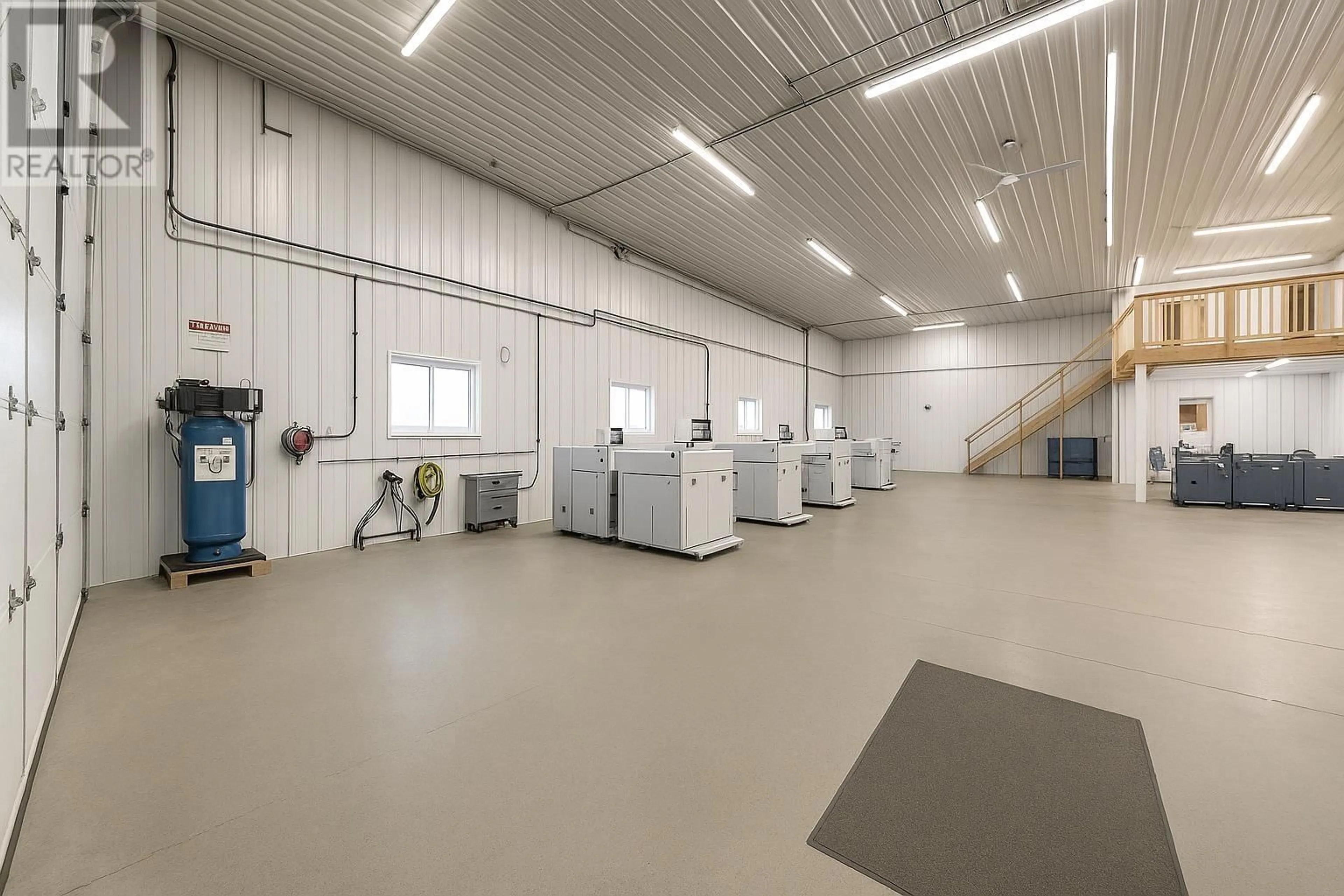 Kitchen with laundary machines, cement floor for 12201 PACIFIC AVENUE, Fort St. John British Columbia V1J8A5