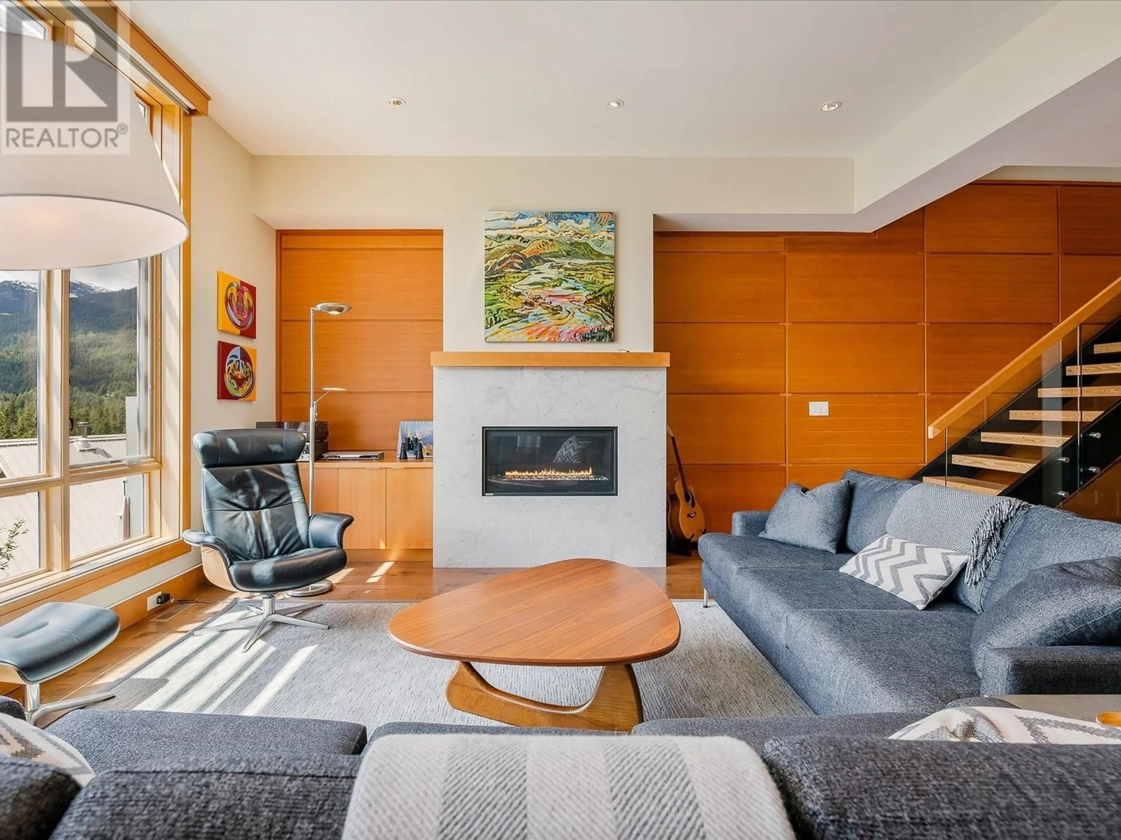 Living room with furniture, wood/laminate floor for 29 - 8400 ASHLEIGH MCIVOR DRIVE, Whistler British Columbia V8E1A9