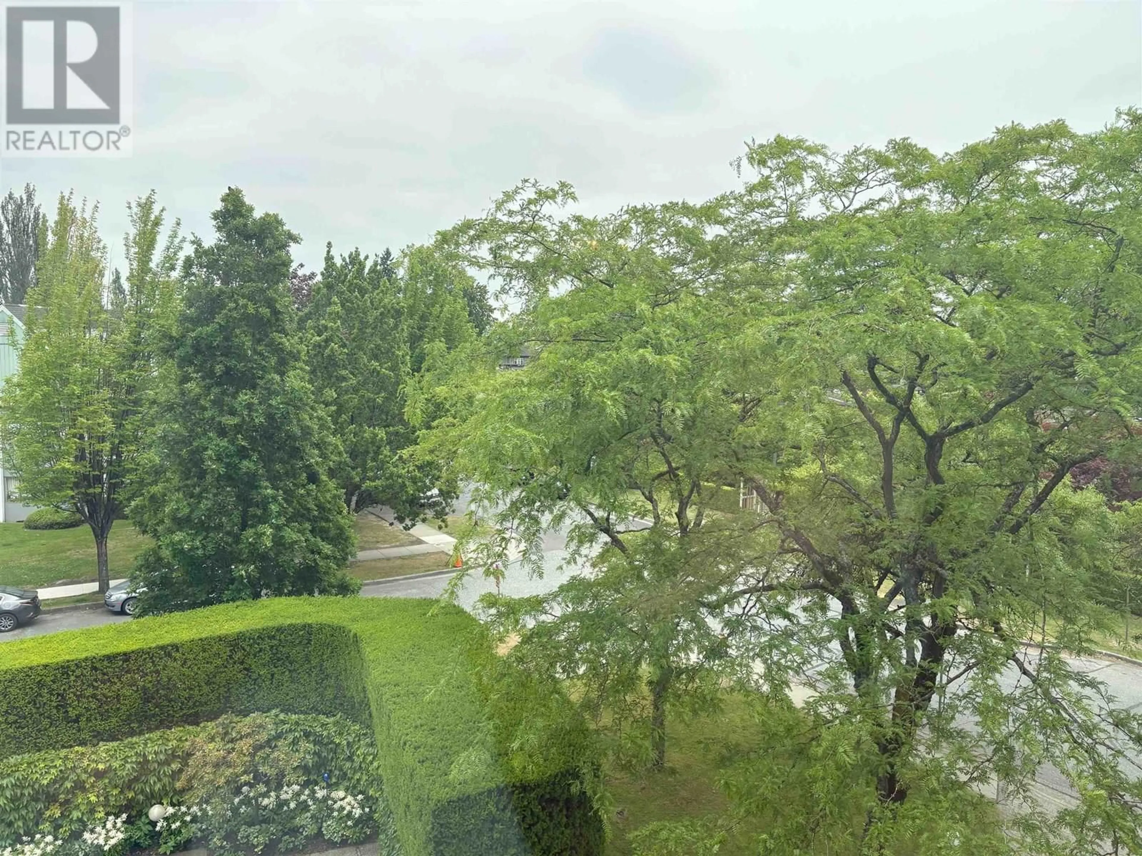 A pic from outside/outdoor area/front of a property/back of a property/a pic from drone, water/lake/river/ocean view for 305 - 6076 TISDALL STREET, Vancouver British Columbia V5Z3N2