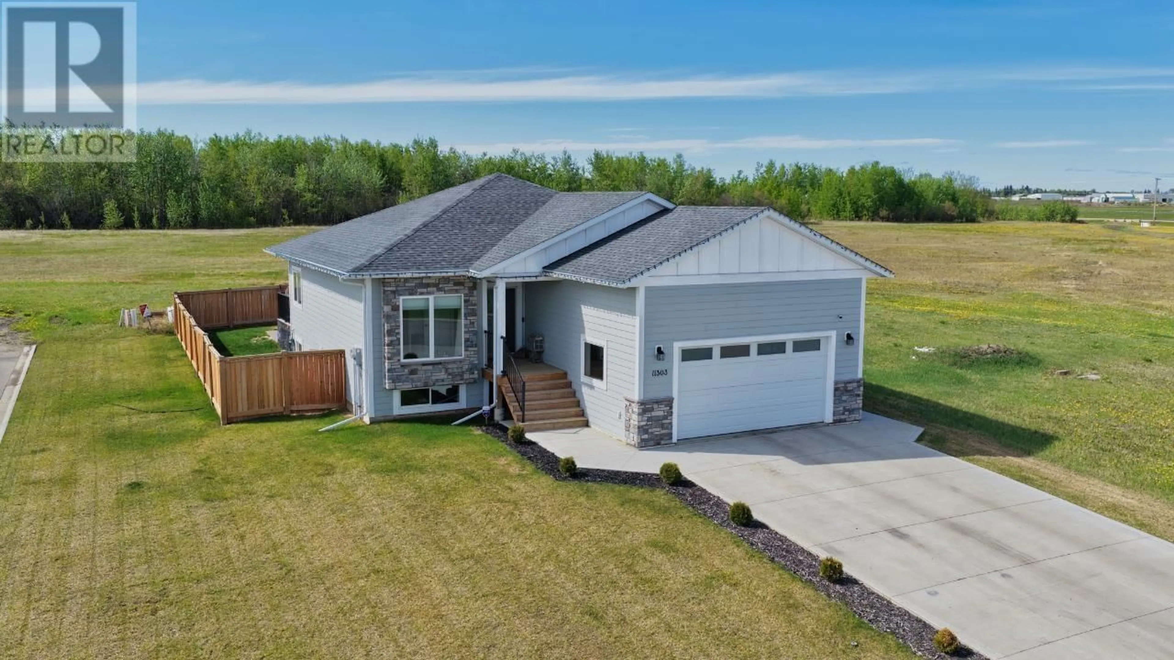 A pic from outside/outdoor area/front of a property/back of a property/a pic from drone, street for 11303 112 AVENUE, Fort St. John British Columbia V1J0R5