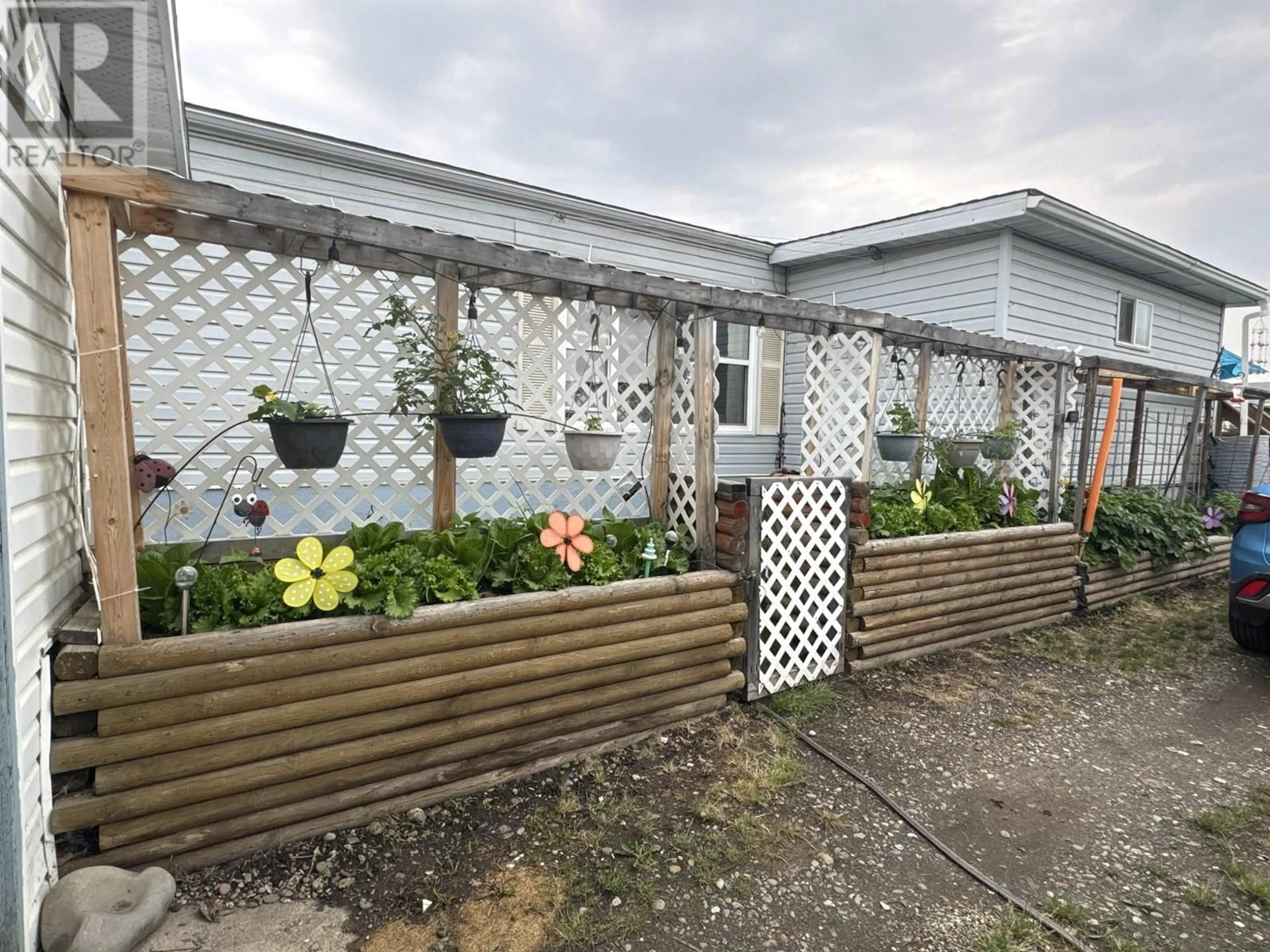 A pic from outside/outdoor area/front of a property/back of a property/a pic from drone, building for 10062 99 STREET, Taylor British Columbia V0C2K0