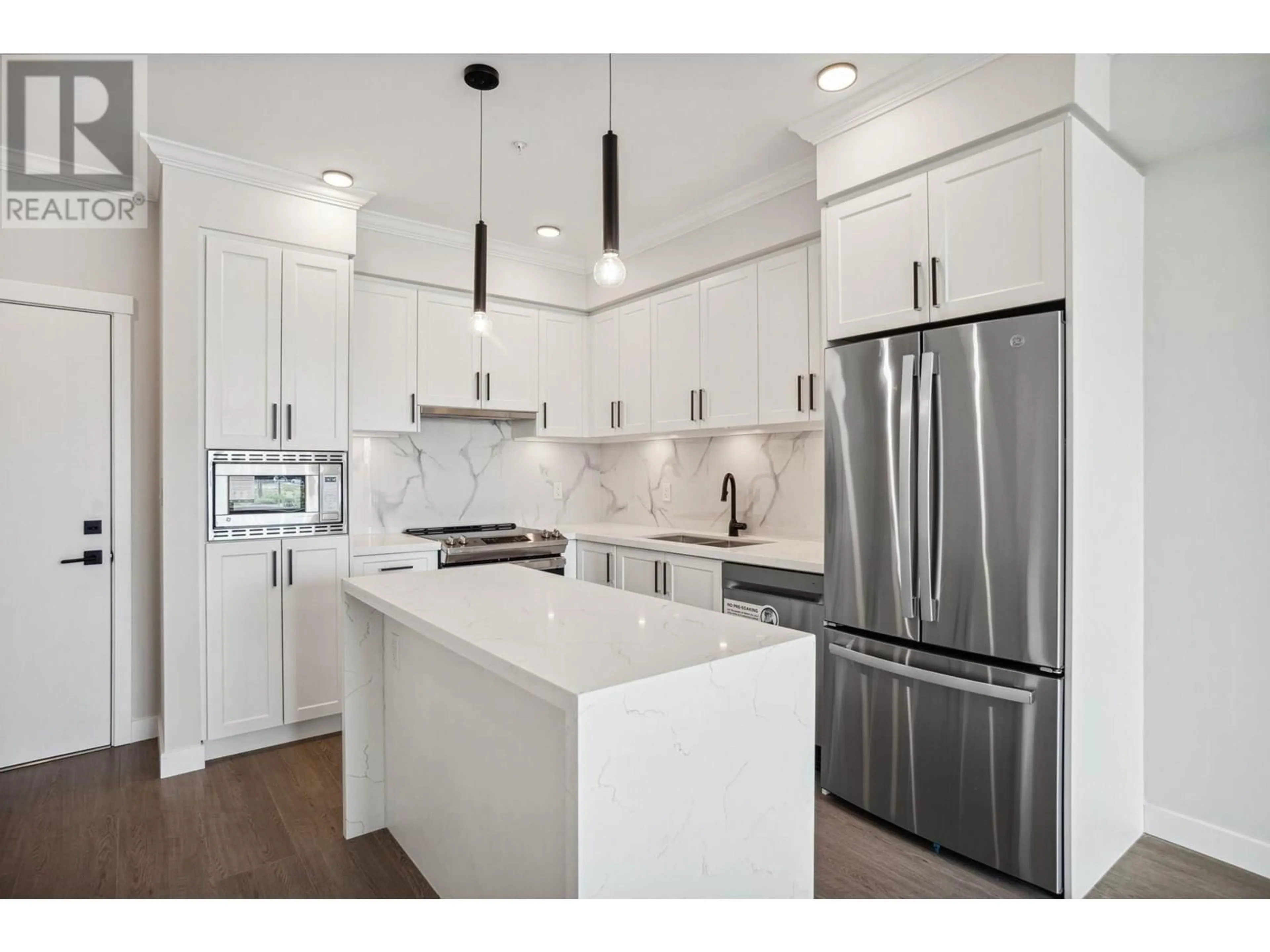 Open concept kitchen, unknown for 213 - 12109 223 STREET, Maple Ridge British Columbia V2X3R6