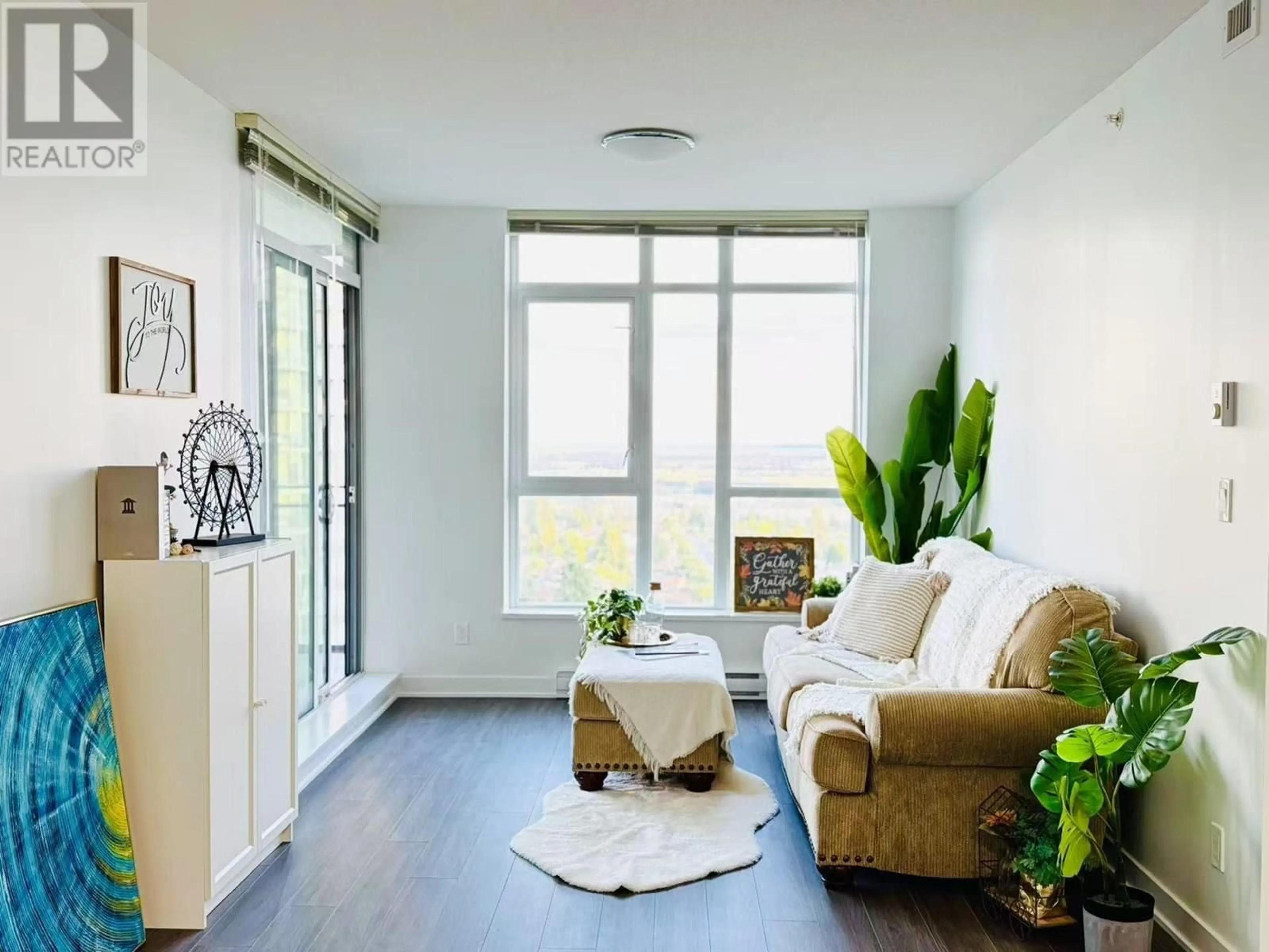 Living room with furniture, unknown for 2101 - 4900 LENNOX LANE, Burnaby British Columbia V5H0G9