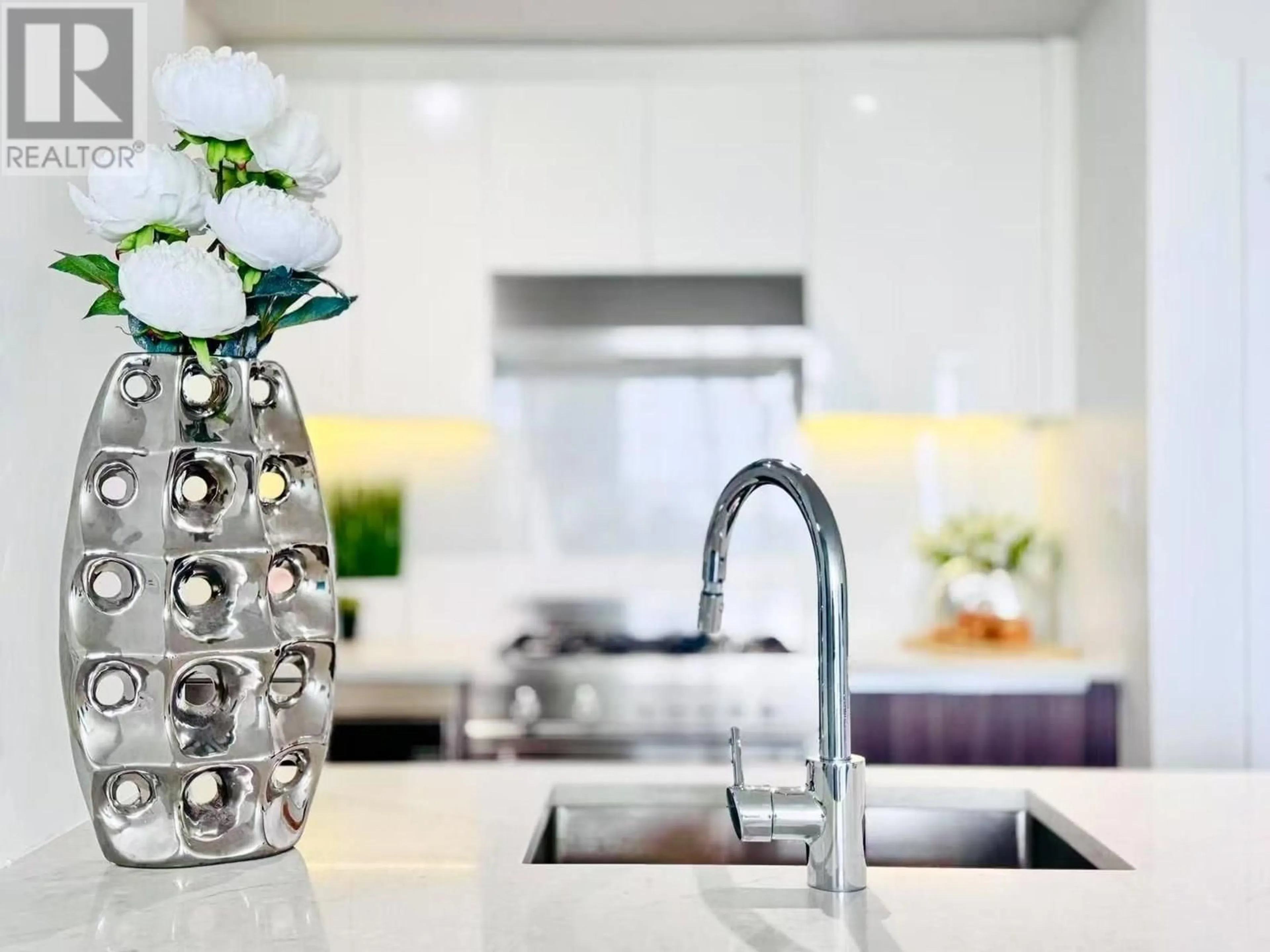 Contemporary kitchen, ceramic/tile floor for 2101 - 4900 LENNOX LANE, Burnaby British Columbia V5H0G9