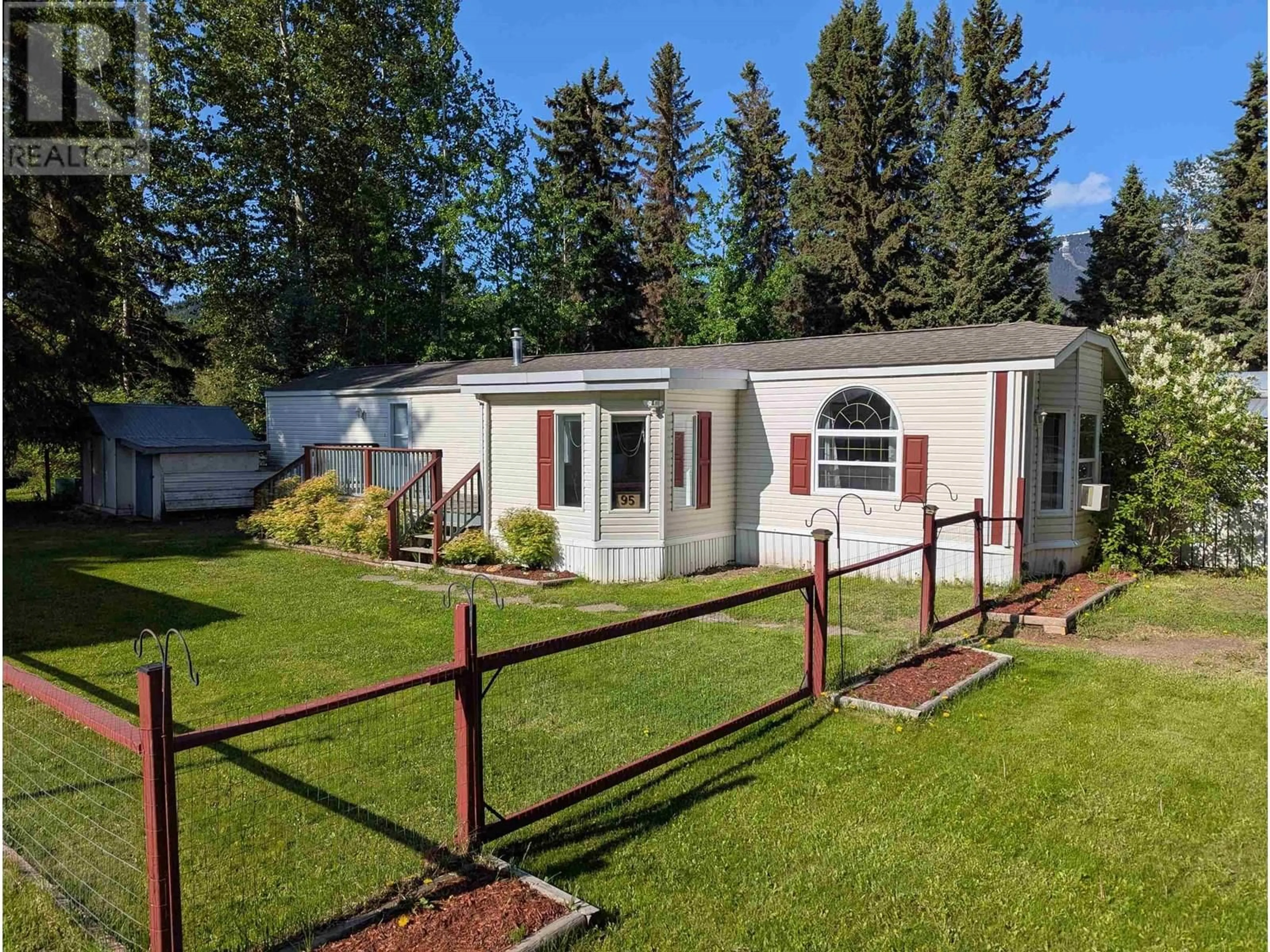 Home with vinyl exterior material, street for 95 - 4430 16 HIGHWAY, Smithers British Columbia V0J2N0