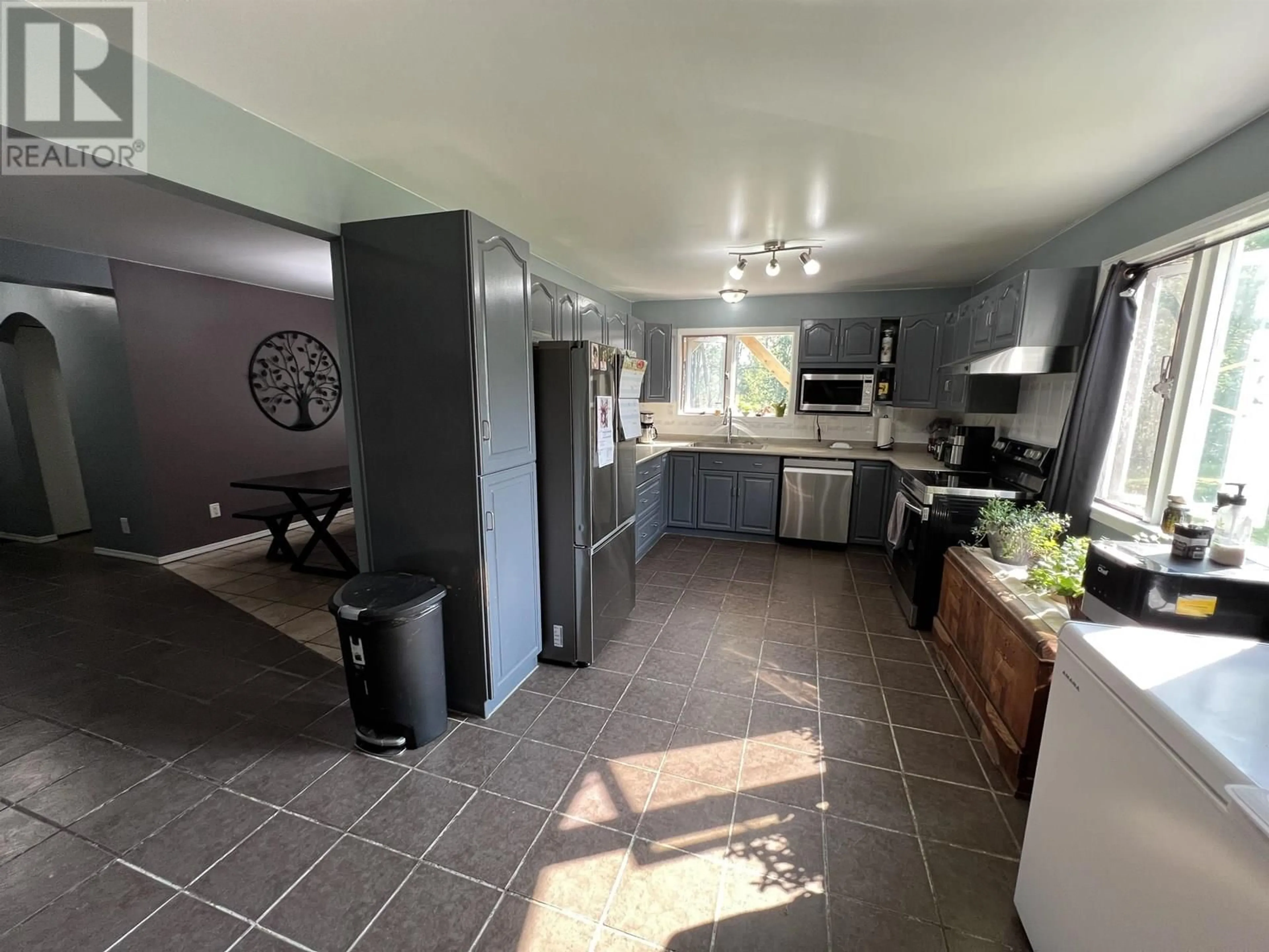 Open concept kitchen, ceramic/tile floor for 16 WALSH ROAD, Fort Nelson British Columbia V0C1R0