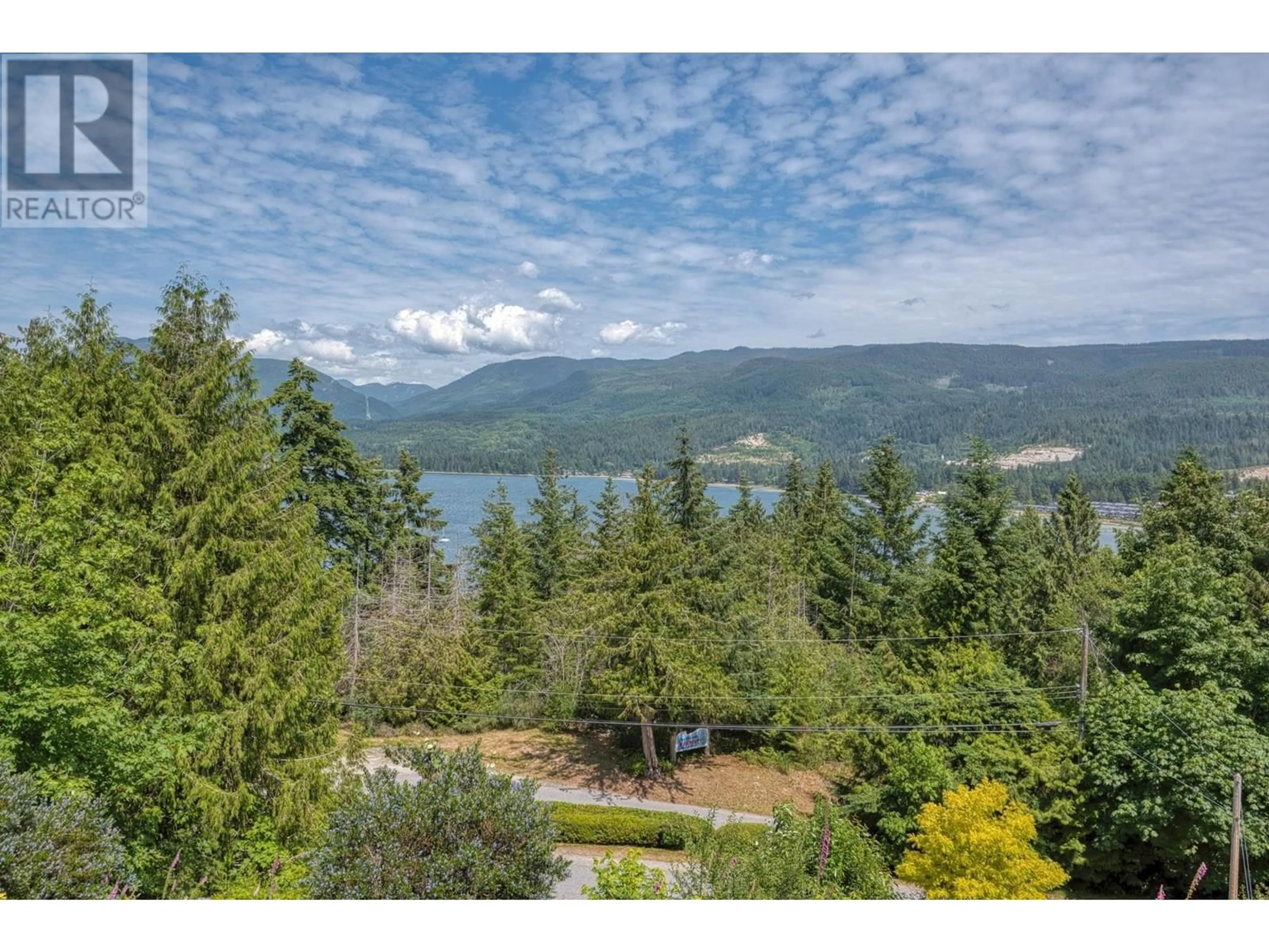 A pic from outside/outdoor area/front of a property/back of a property/a pic from drone, water/lake/river/ocean view for W201 - 5780 TRAIL AVENUE, Sechelt British Columbia V7Z0K5