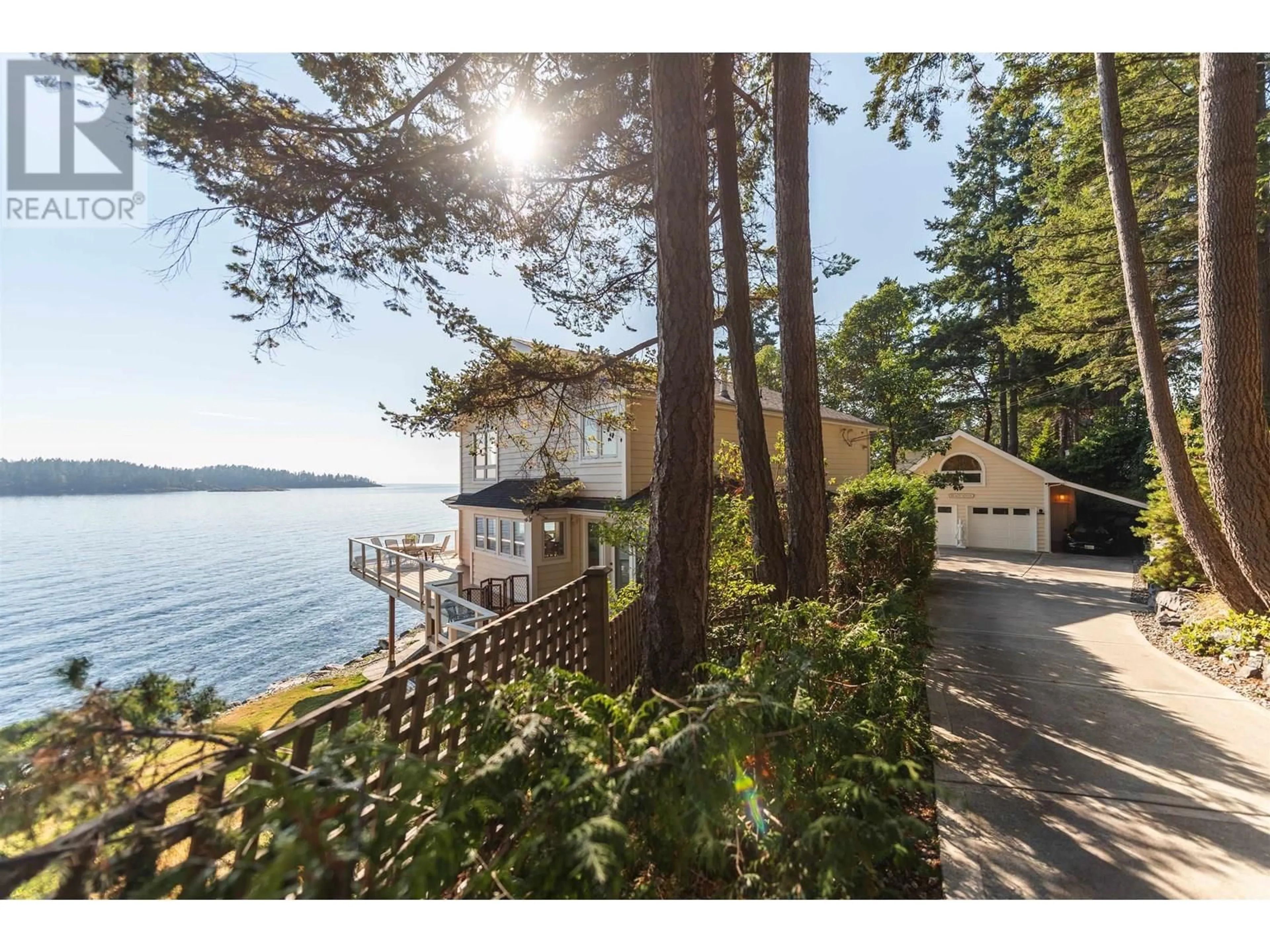 A pic from outside/outdoor area/front of a property/back of a property/a pic from drone, water/lake/river/ocean view for 6655 SUNSHINE COAST HIGHWAY, Sechelt British Columbia V7Z0M9