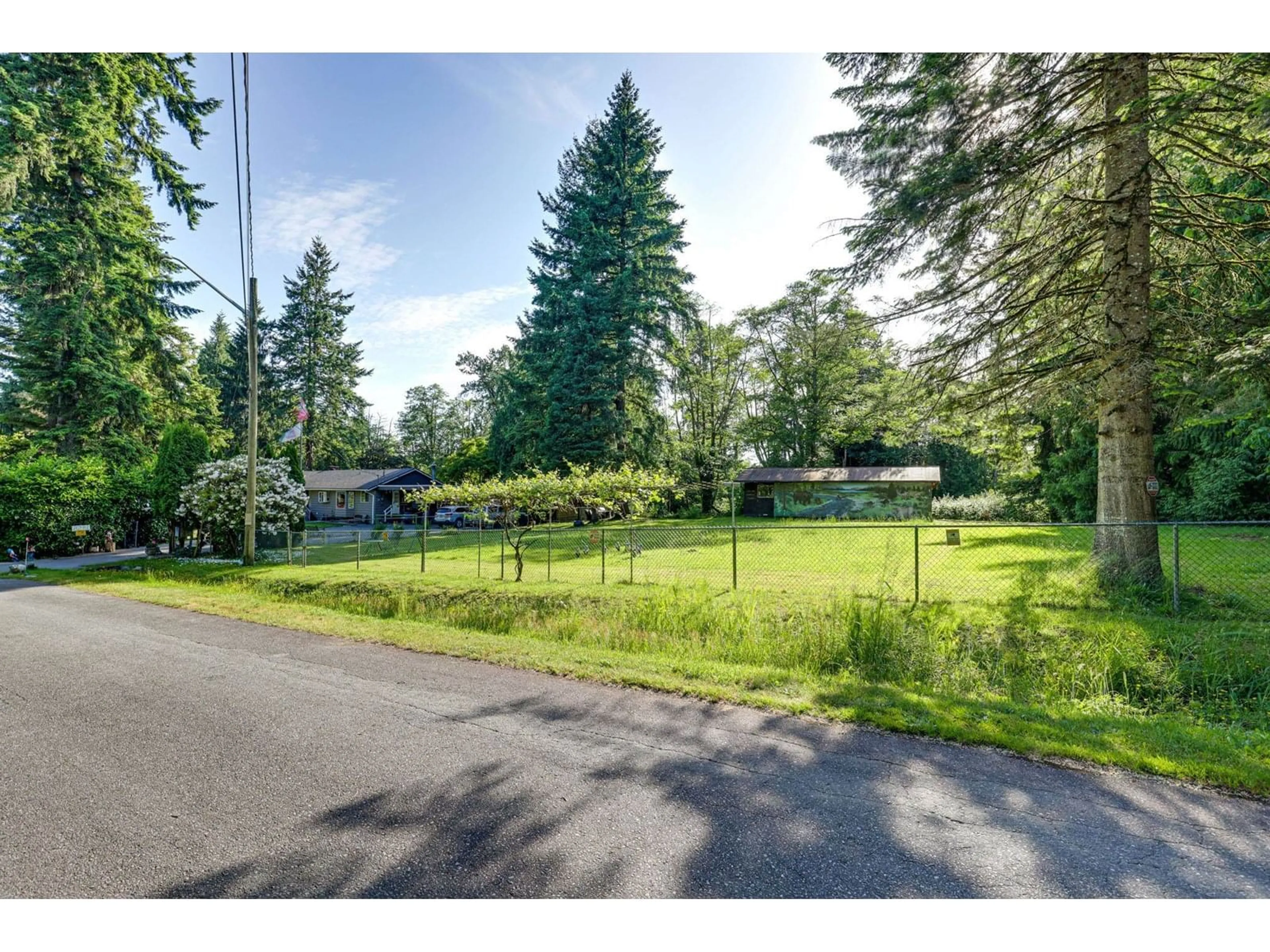 A pic from outside/outdoor area/front of a property/back of a property/a pic from drone, unknown for 8281 148, Surrey British Columbia V3S3G2