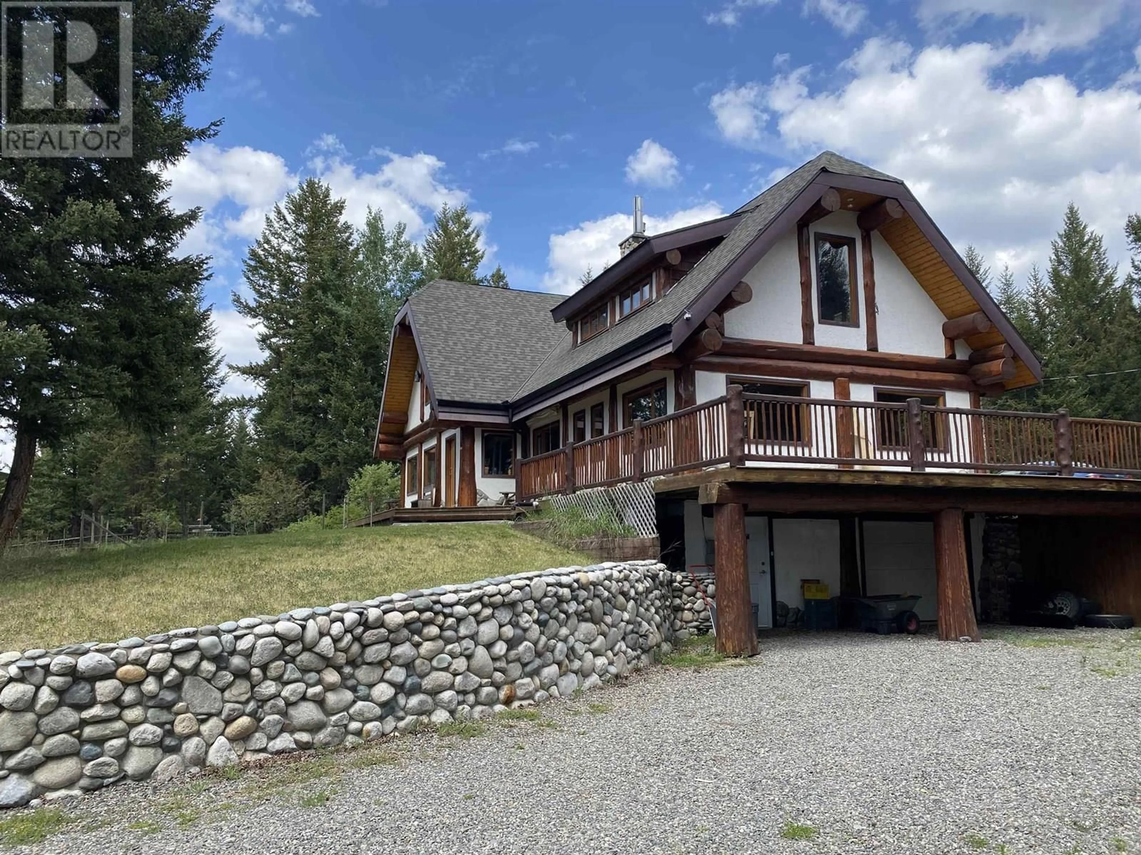 A pic from outside/outdoor area/front of a property/back of a property/a pic from drone, mountain view for 6419 LAMBLEY ROAD, 100 Mile House British Columbia V0K2E3