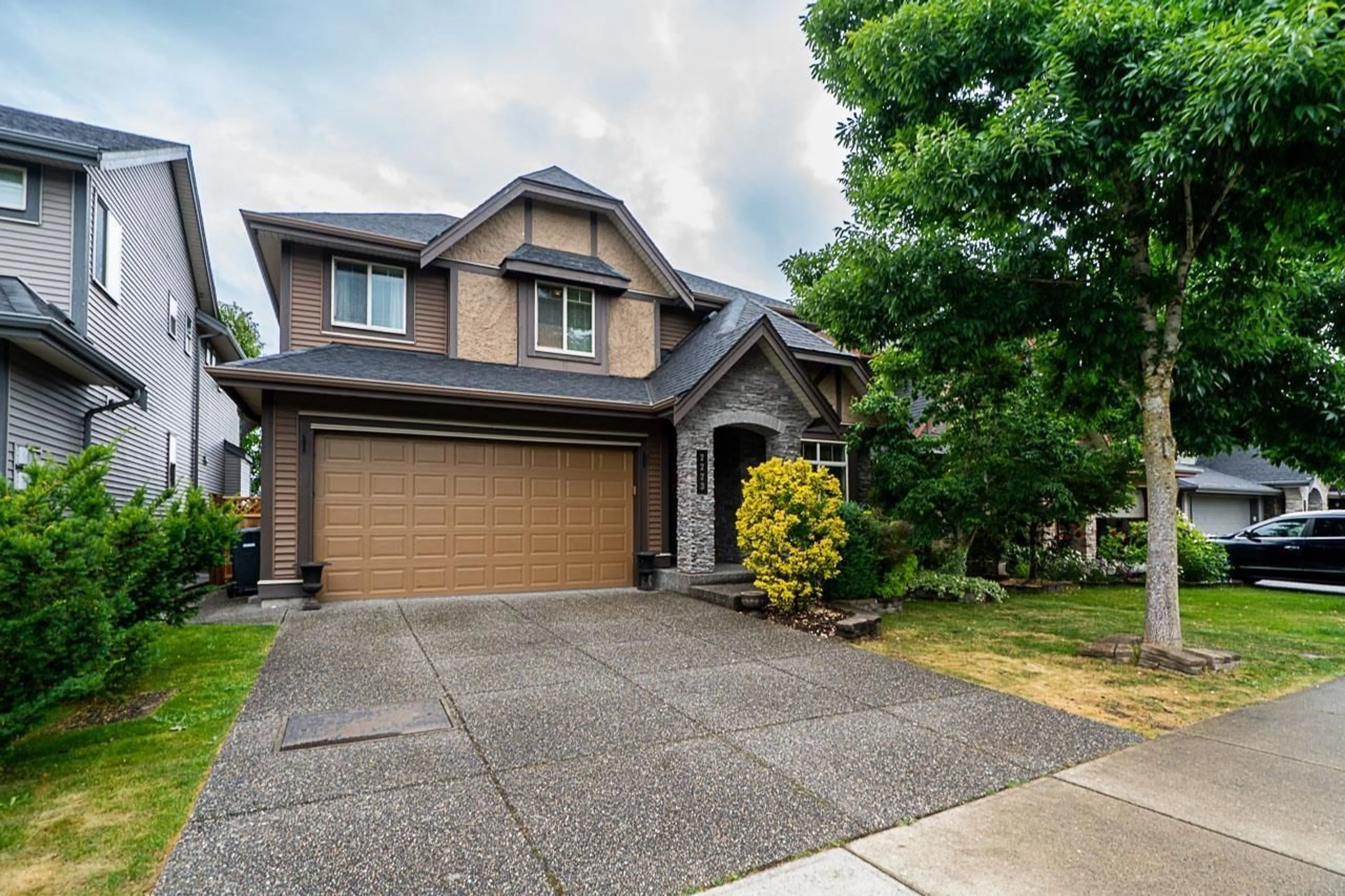 Home with vinyl exterior material, street for 7773 211TH, Langley British Columbia V2Y0H8