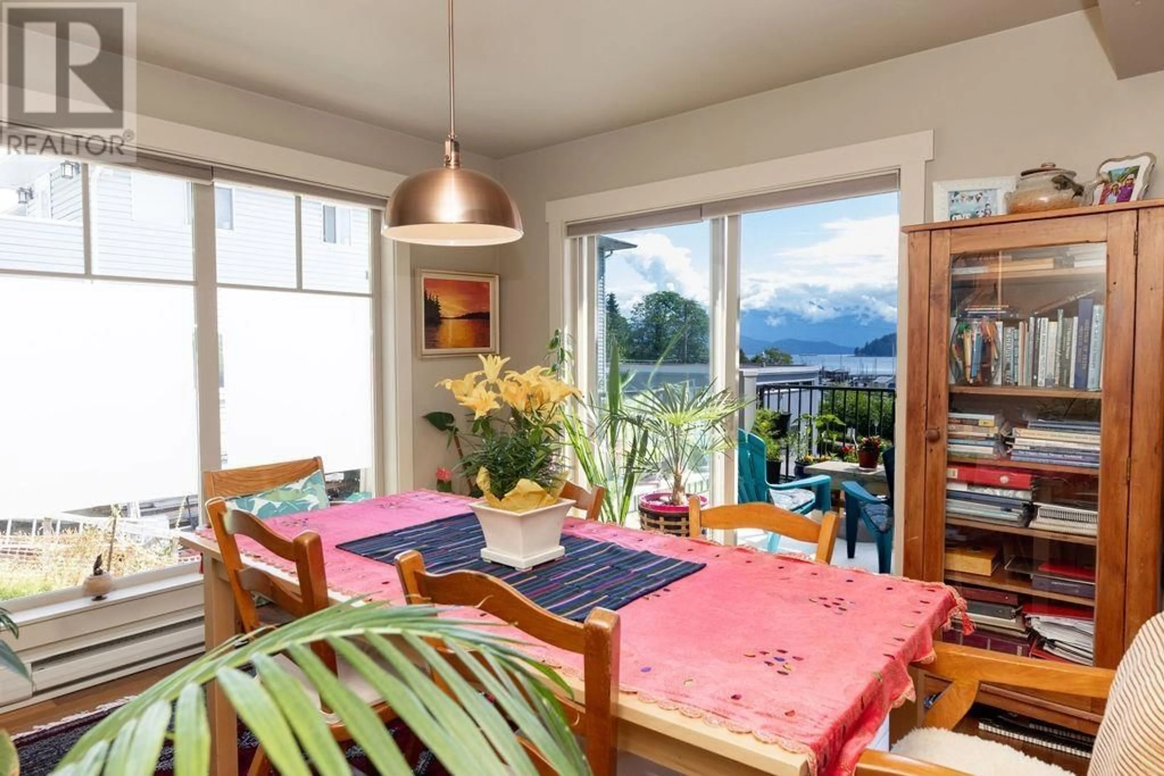 Dining room, wood/laminate floor for 206 - 414 GOWER POINT ROAD, Gibsons British Columbia V0N1V0