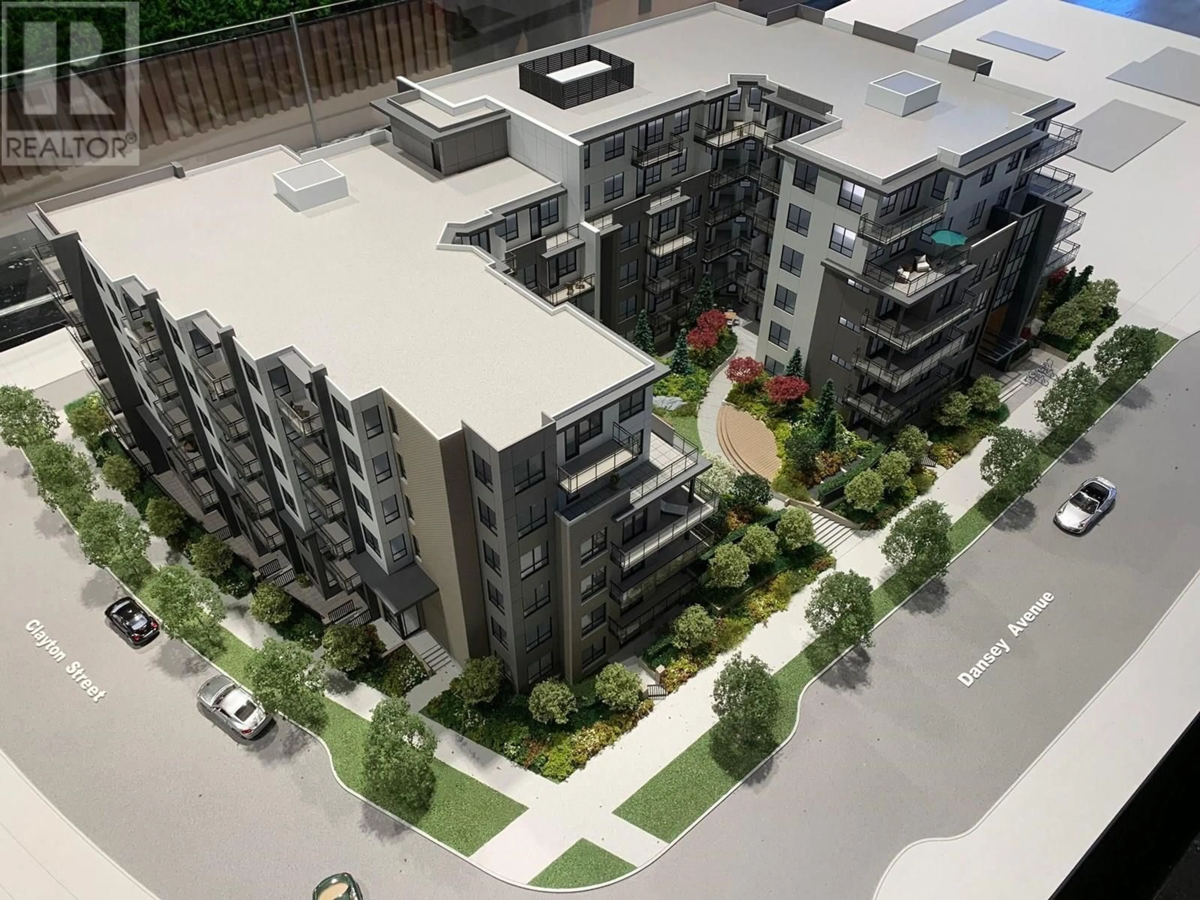 A pic from outside/outdoor area/front of a property/back of a property/a pic from drone, unknown for 102 - 599 DANSEY AVENUE, Coquitlam British Columbia V3K0J5