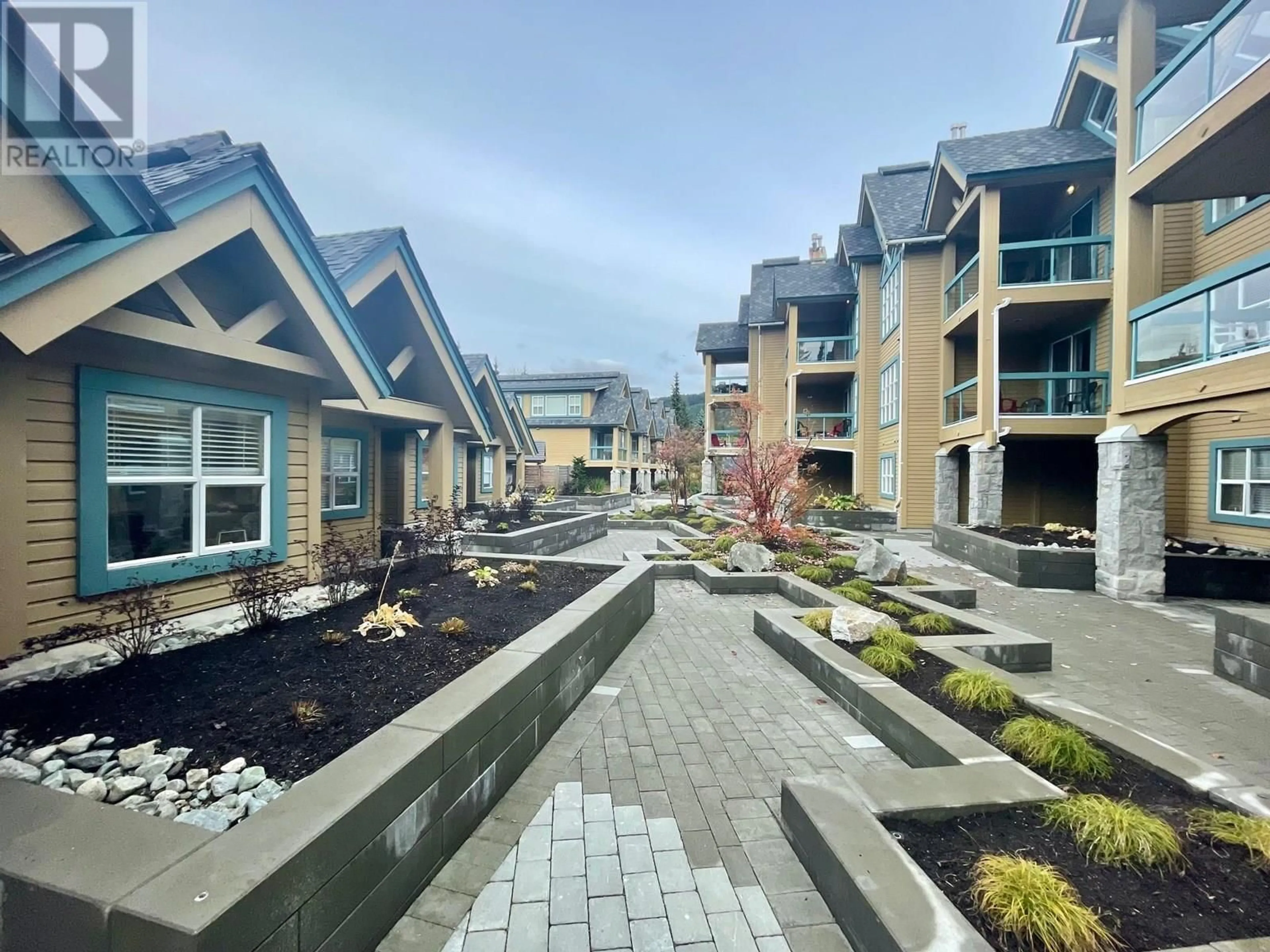 A pic from outside/outdoor area/front of a property/back of a property/a pic from drone, street for 208 - 4865 PAINTED CLIFF ROAD, Whistler British Columbia V0N1B4