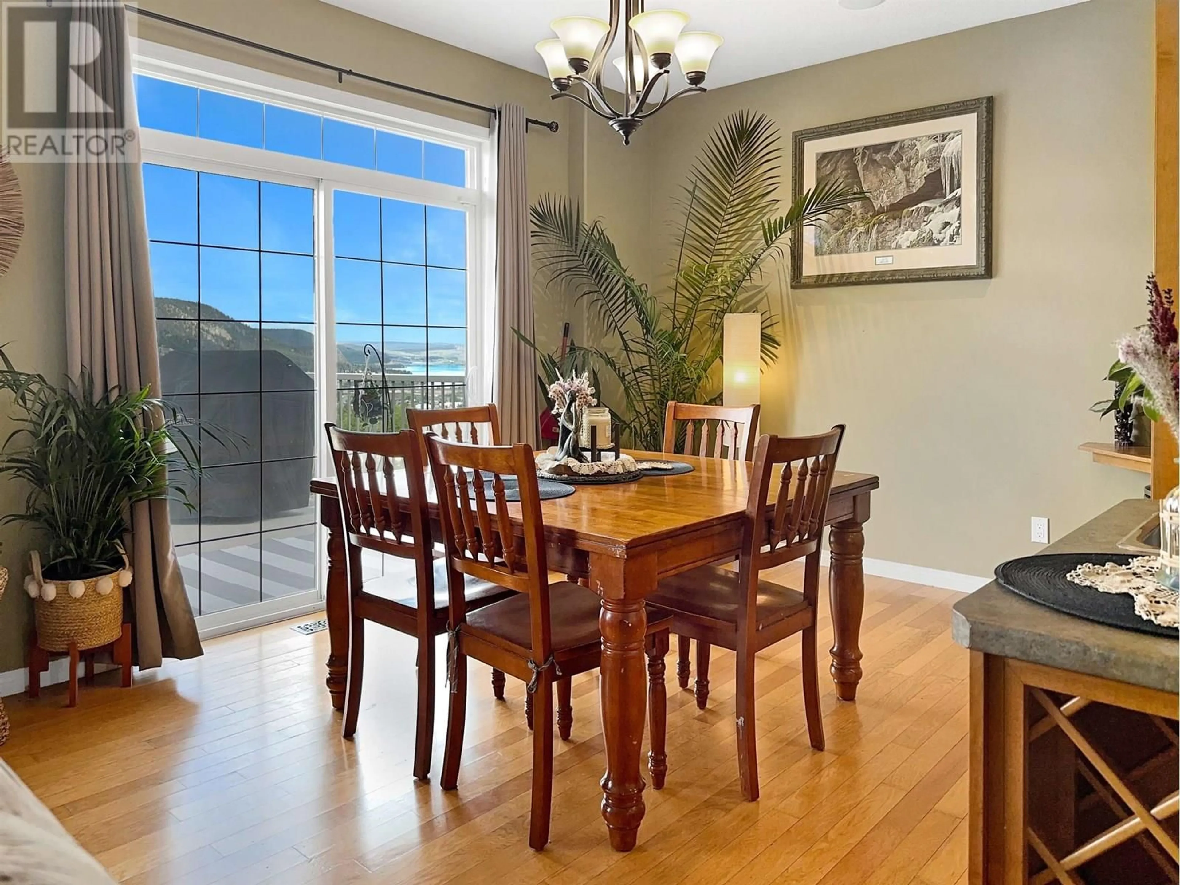 Dining room, wood/laminate floor for 128 - 375 MANDARINO PLACE, Williams Lake British Columbia V2G4V3