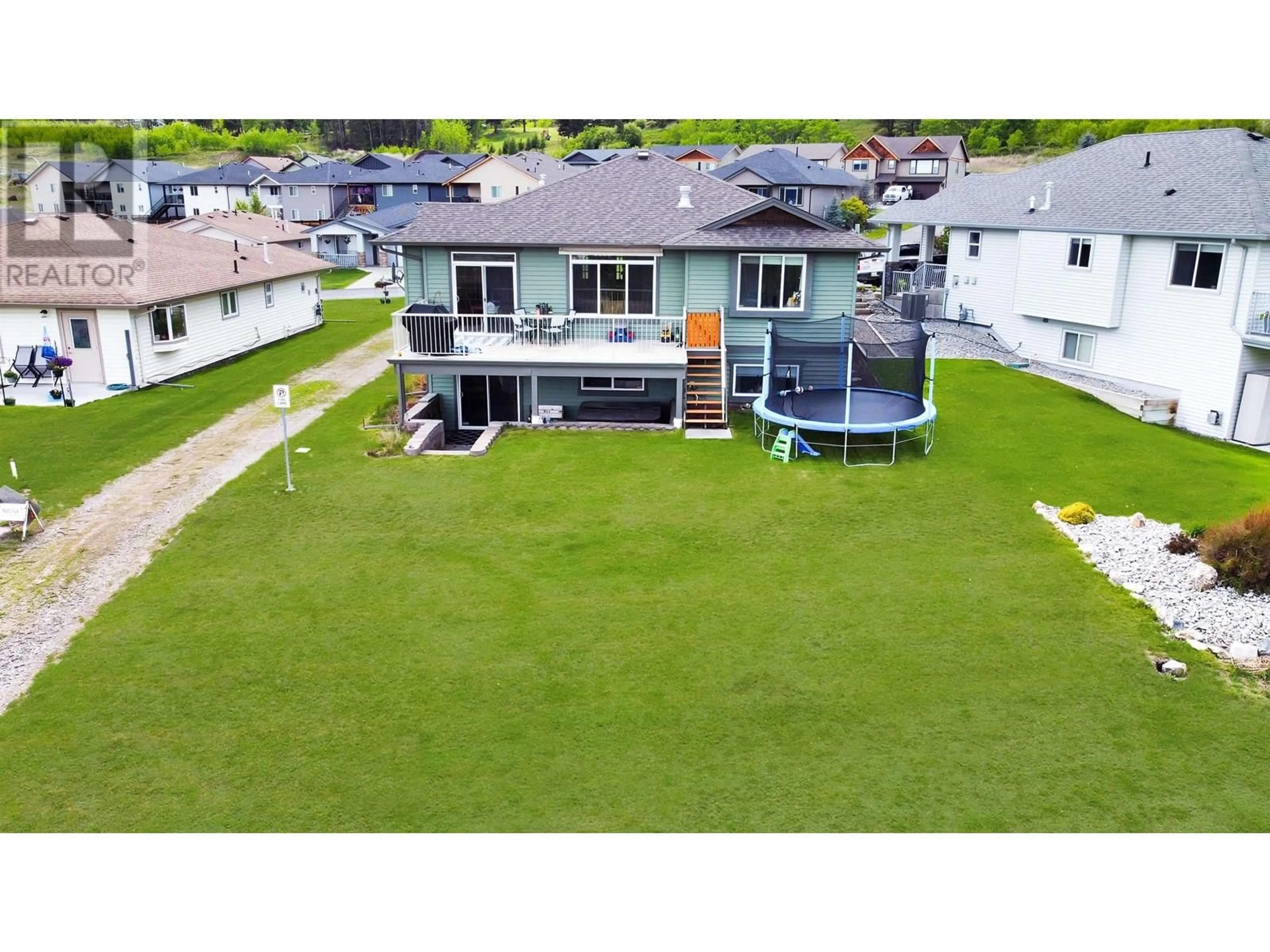 A pic from outside/outdoor area/front of a property/back of a property/a pic from drone, water/lake/river/ocean view for 128 - 375 MANDARINO PLACE, Williams Lake British Columbia V2G4V3