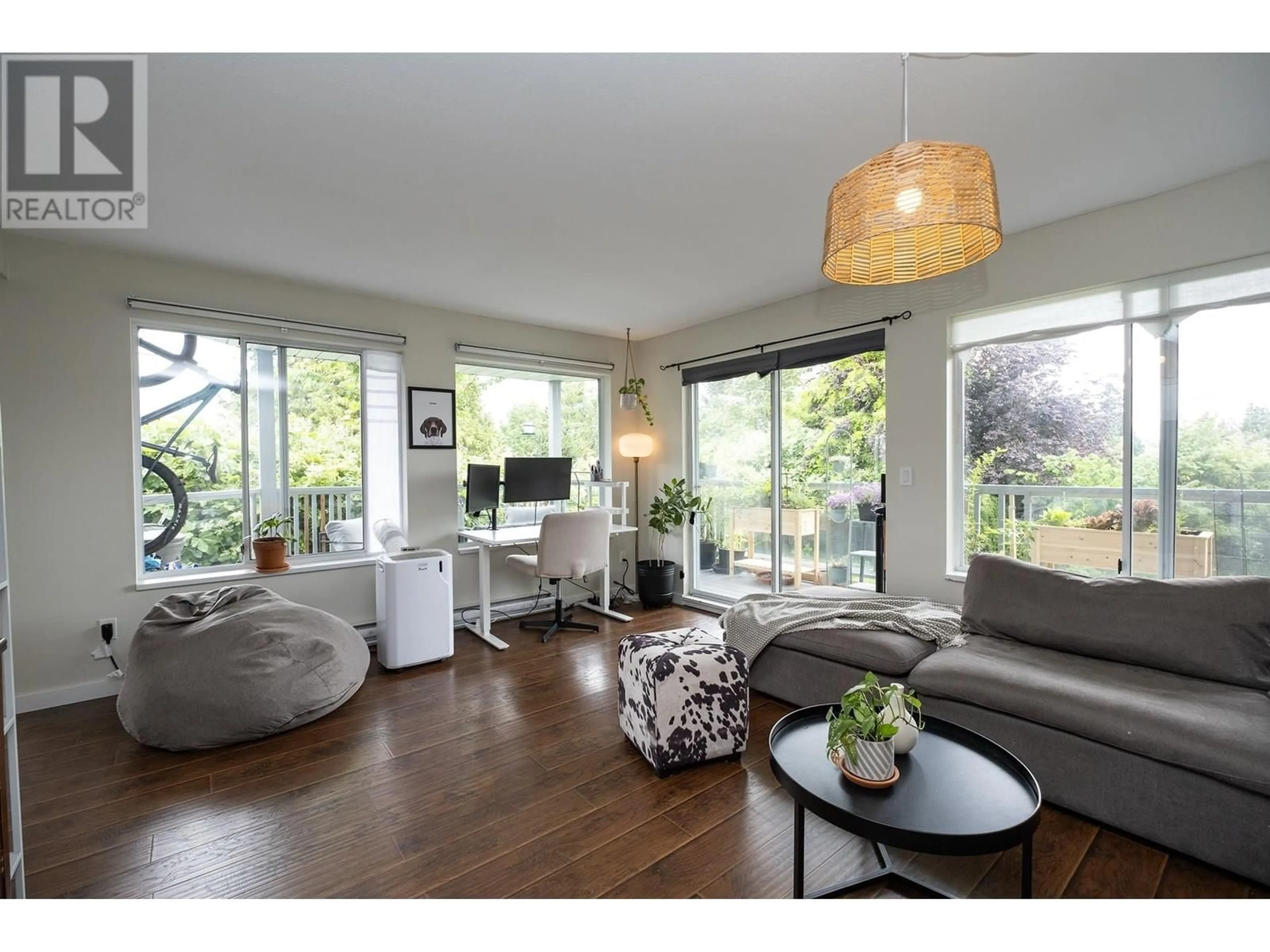 Living room with furniture, wood/laminate floor for 1 - 756 GIBSONS WAY, Gibsons British Columbia V0N1V9