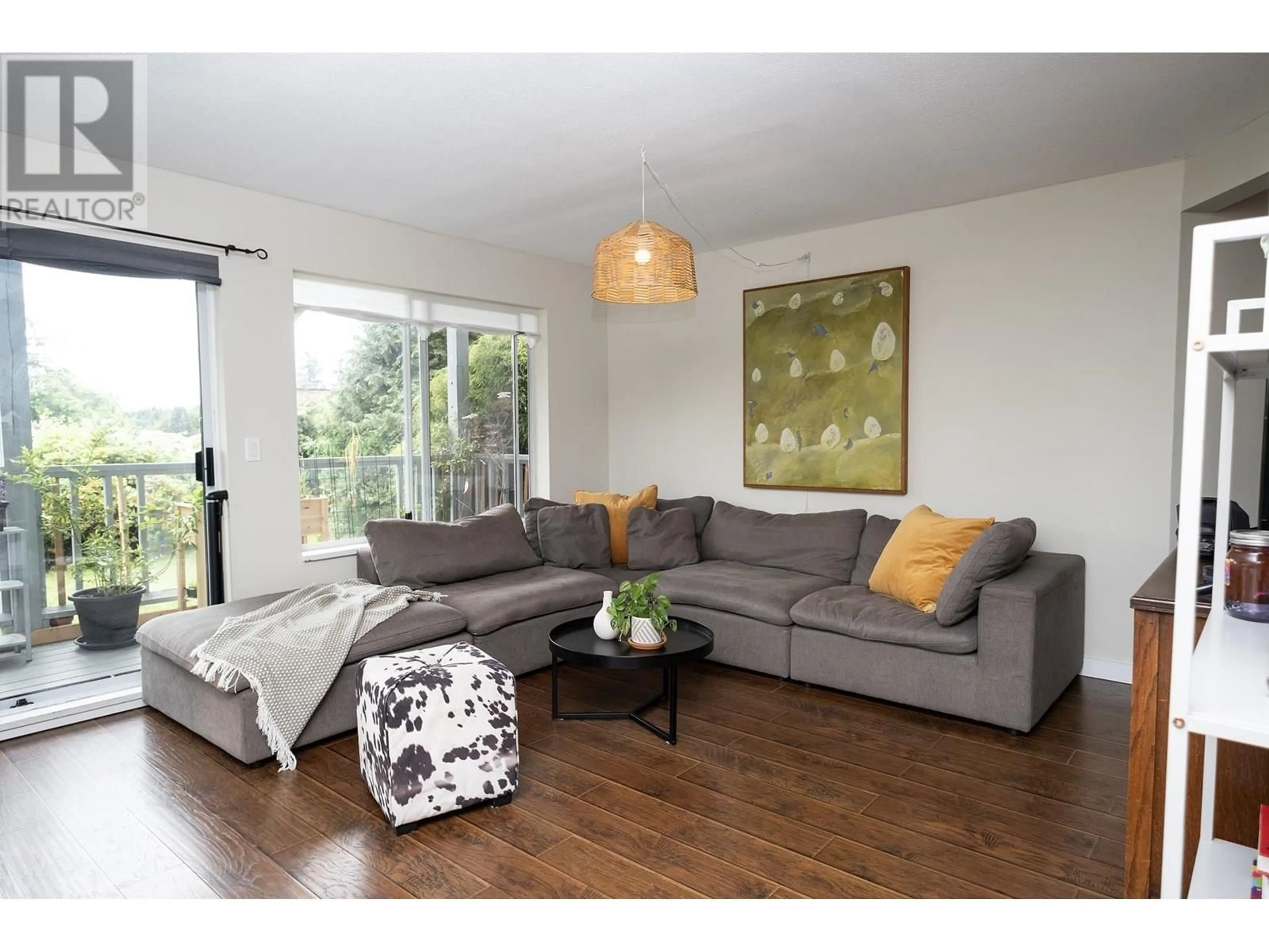 Living room with furniture, wood/laminate floor for 1 - 756 GIBSONS WAY, Gibsons British Columbia V0N1V9